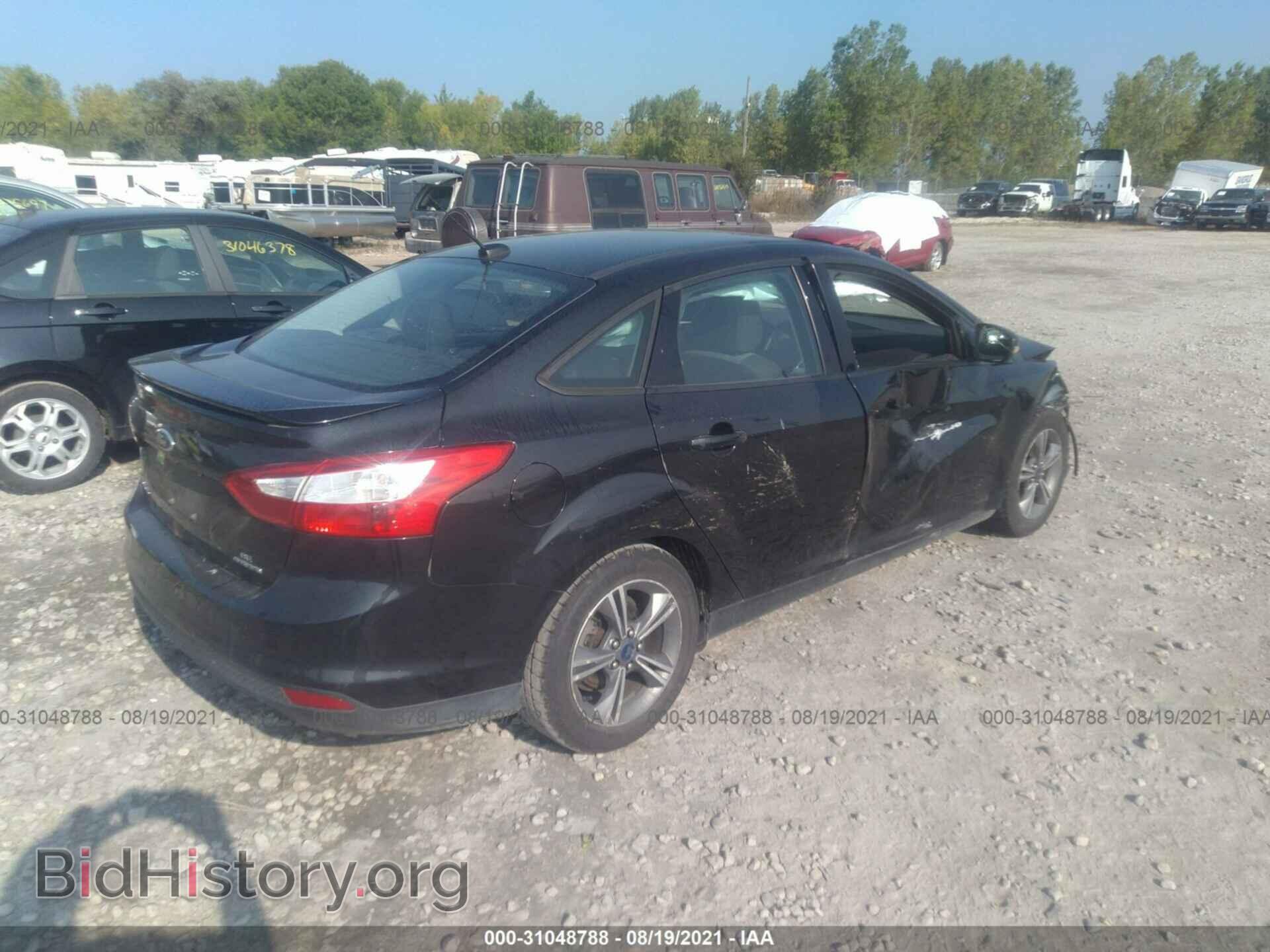 2014 FORD FOCUS - VIN: 1FADP3F22EL269409 - Photo 4