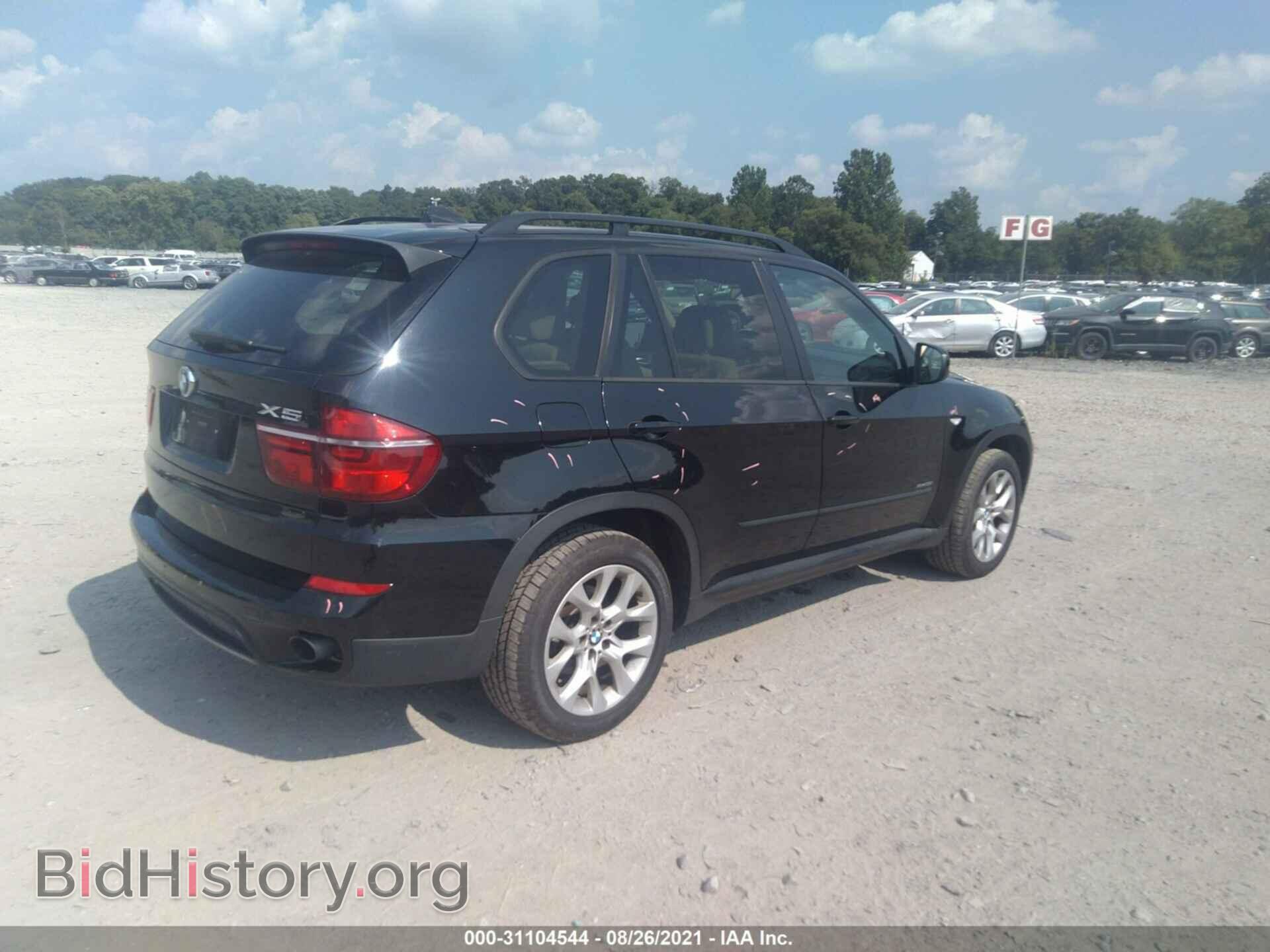 2012 BMW X5 - VIN: 5UXZV4C57CL762041 - Фото 4