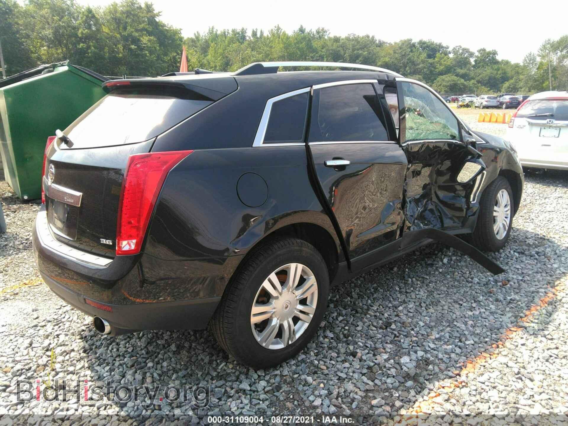 2013 CADILLAC SRX - VIN: 3GYFNCE39DS548247 - Фото 4