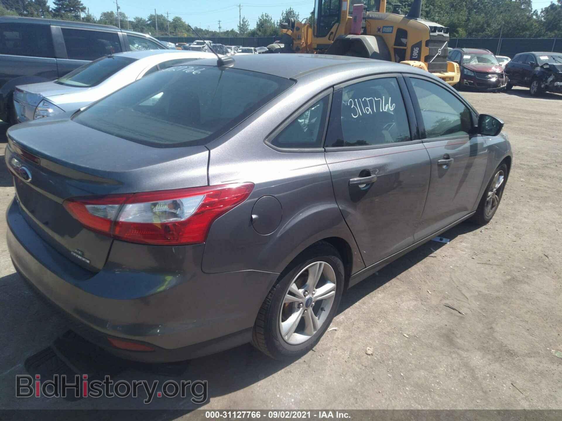 2014 FORD FOCUS - VIN: 1FADP3F27EL105279 - Photo 4