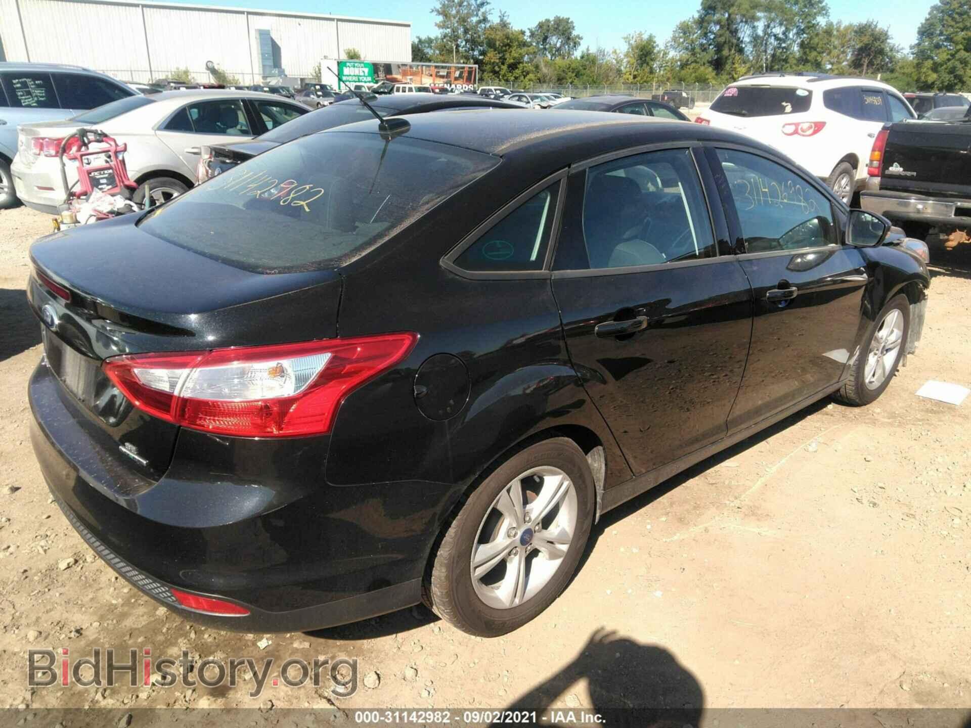 2014 FORD FOCUS - VIN: 1FADP3F26EL429338 - Photo 4