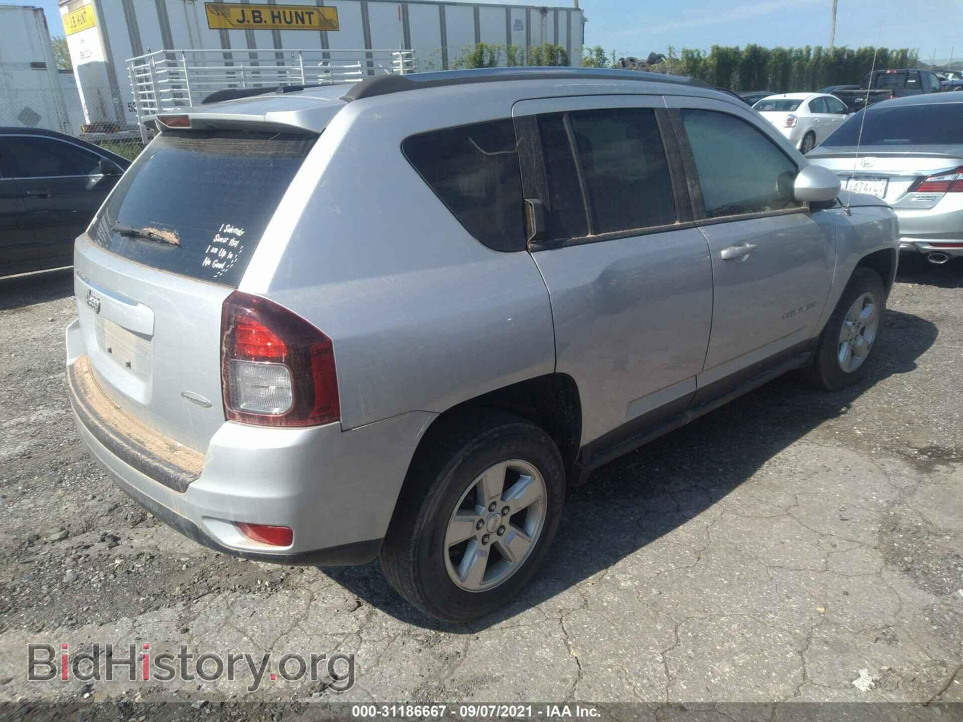 2014 JEEP COMPASS - VIN: 1C4NJCEA5ED606593 - Photo 4