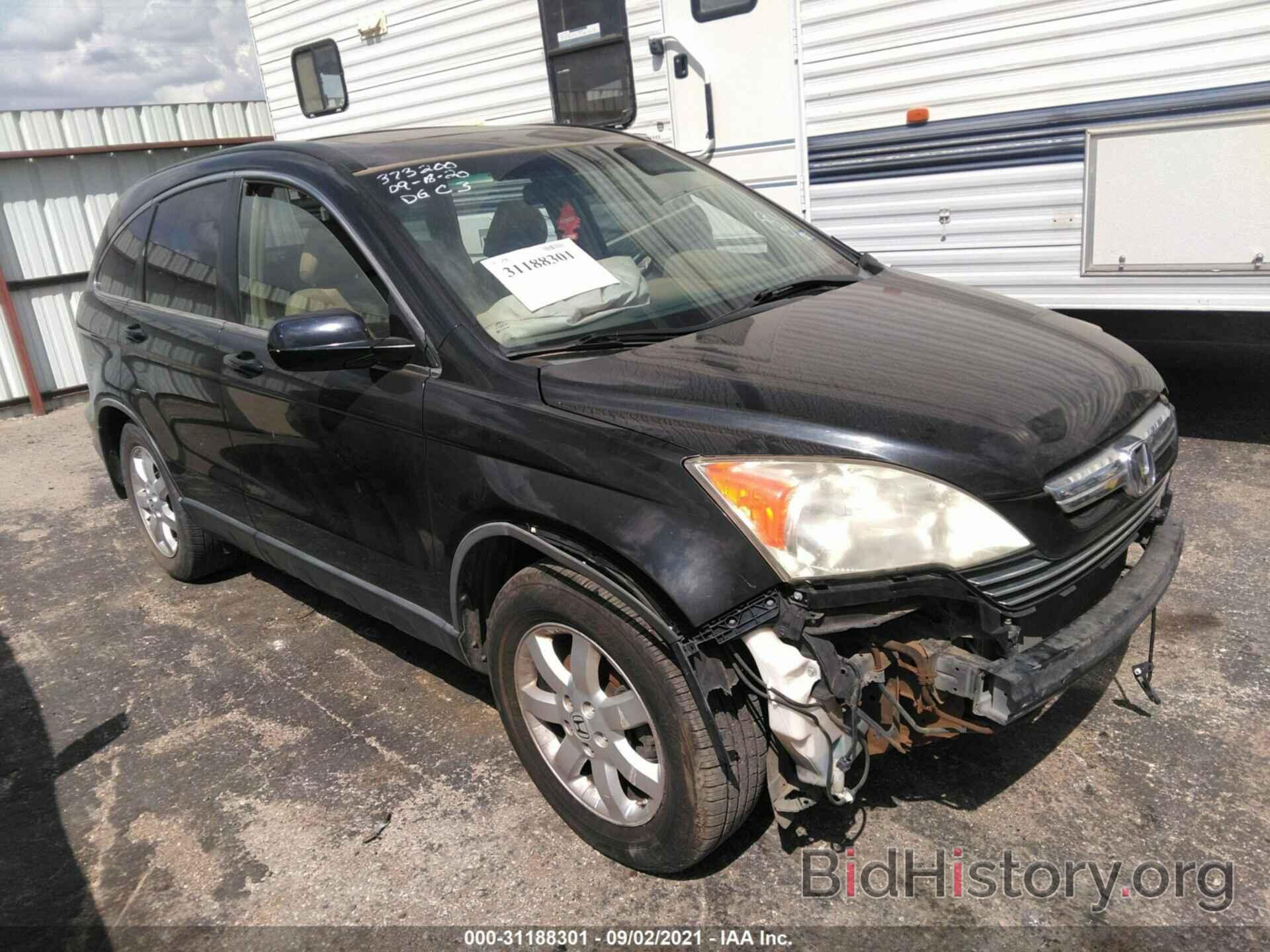 Photo JHLRE38797C023591 - HONDA CR-V 2007