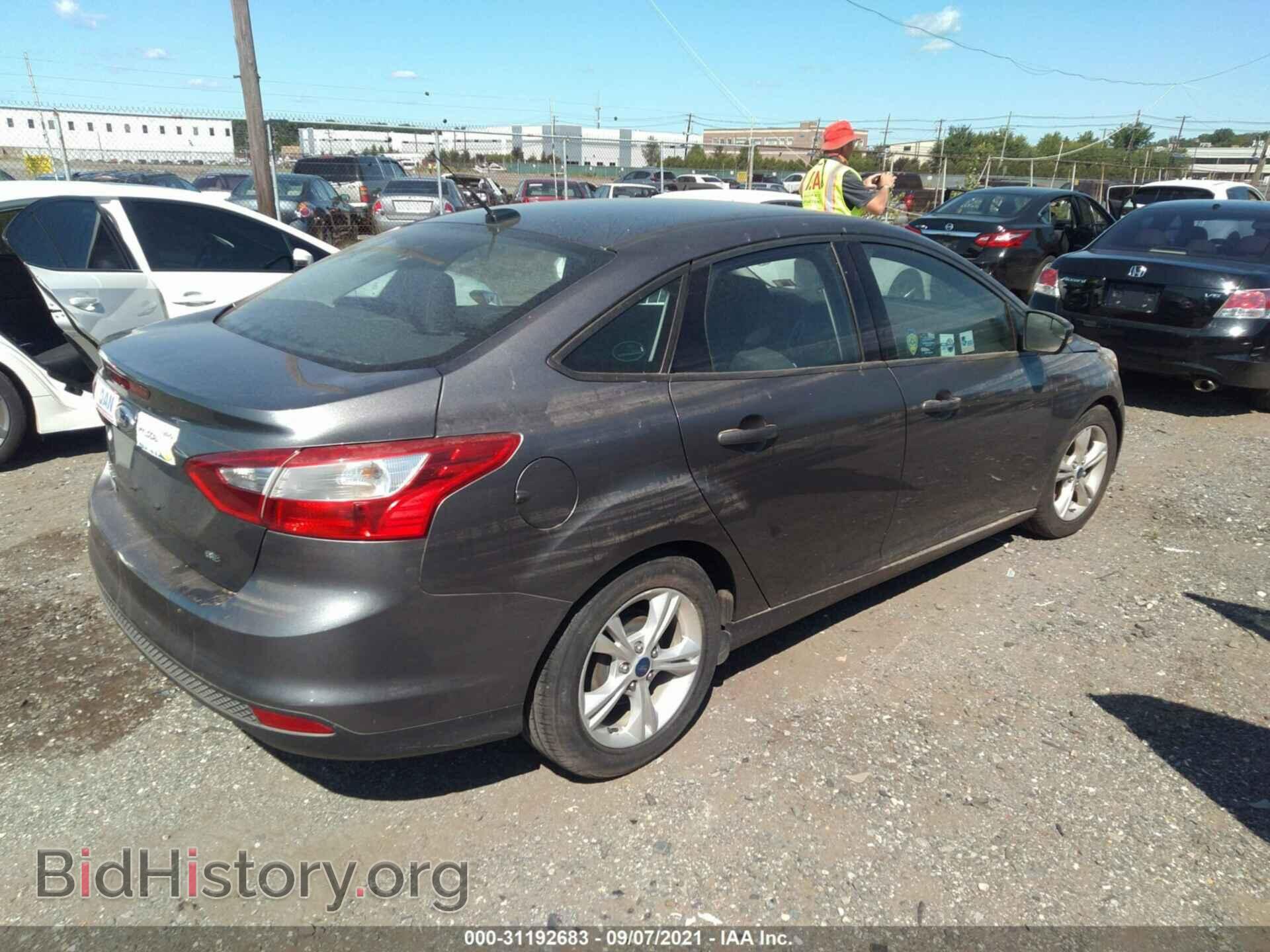 2014 FORD FOCUS - VIN: 1FADP3F24EL409590 - Photo 4