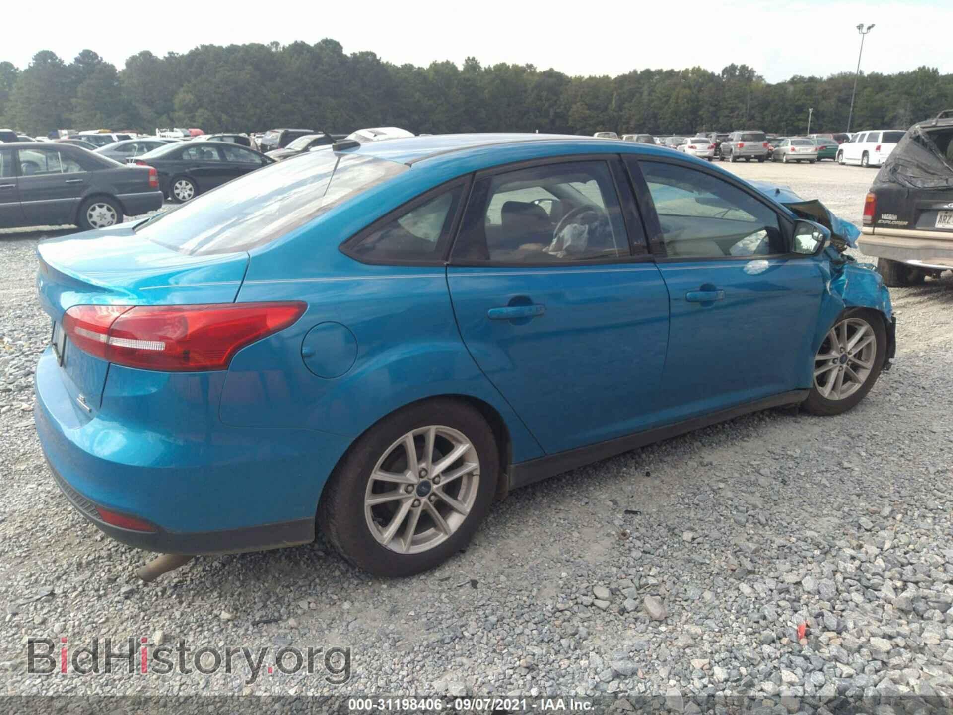 2015 FORD FOCUS - VIN: 1FADP3F24FL374177 - Photo 4