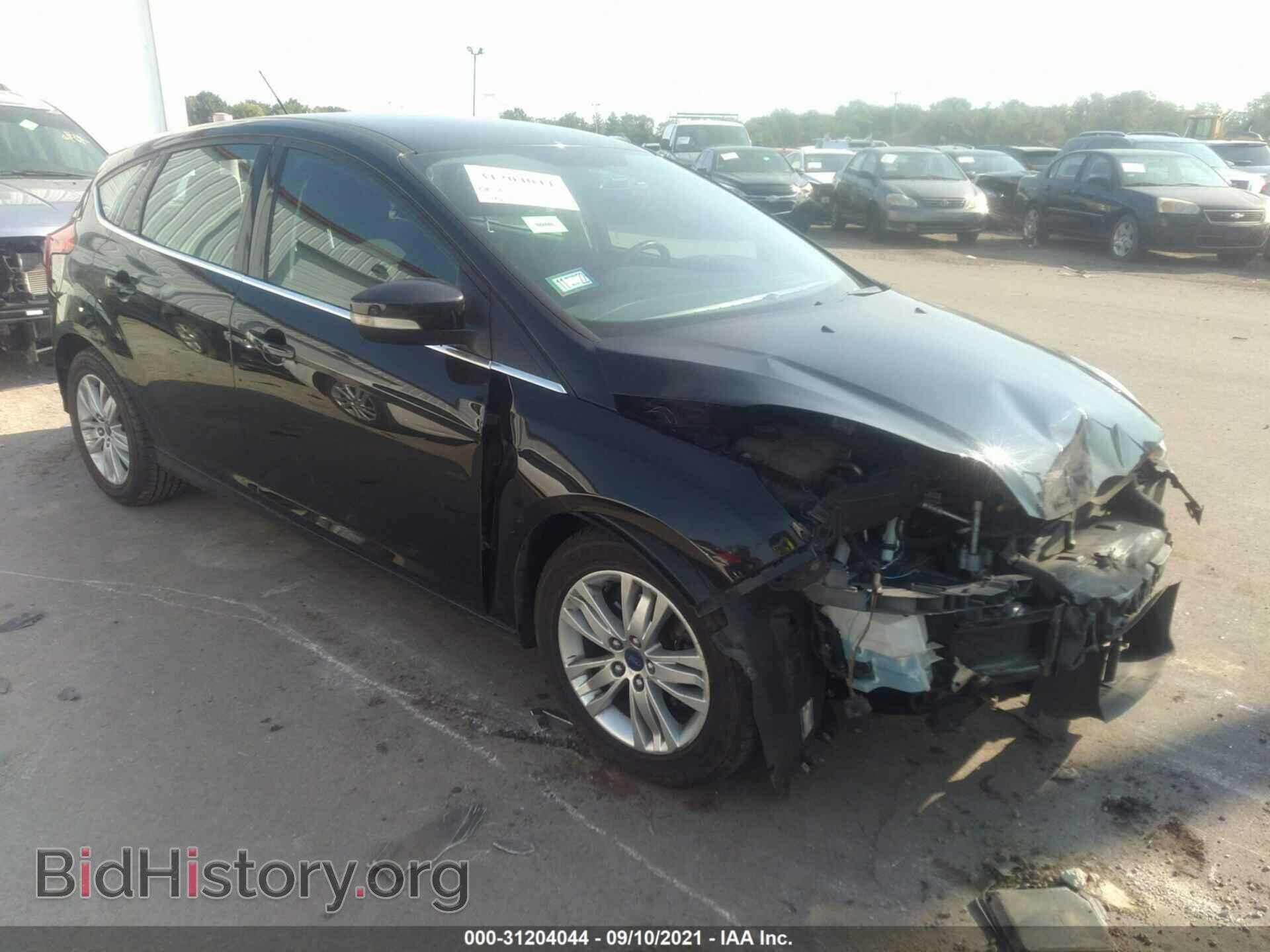 Фотография 1FAHP3M20CL316938 - FORD FOCUS 2012