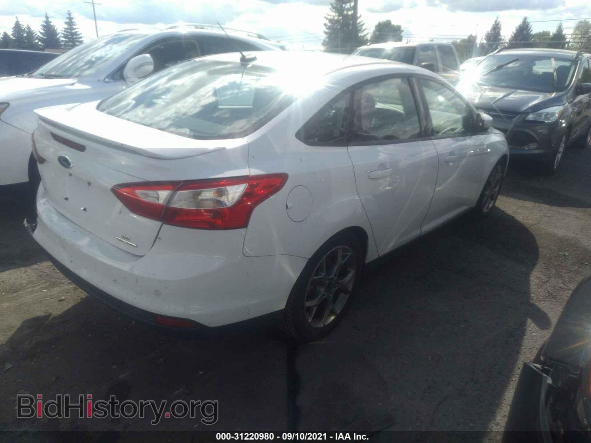 2014 FORD FOCUS - VIN: 1FADP3F21EL405691 - Photo 4