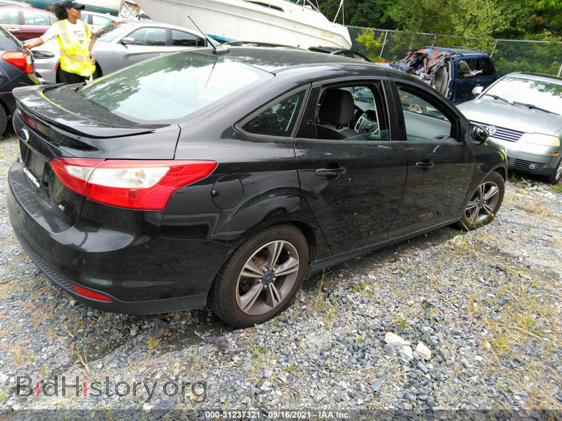 2014 FORD FOCUS - VIN: 1FADP3F27EL386693 - Photo 4