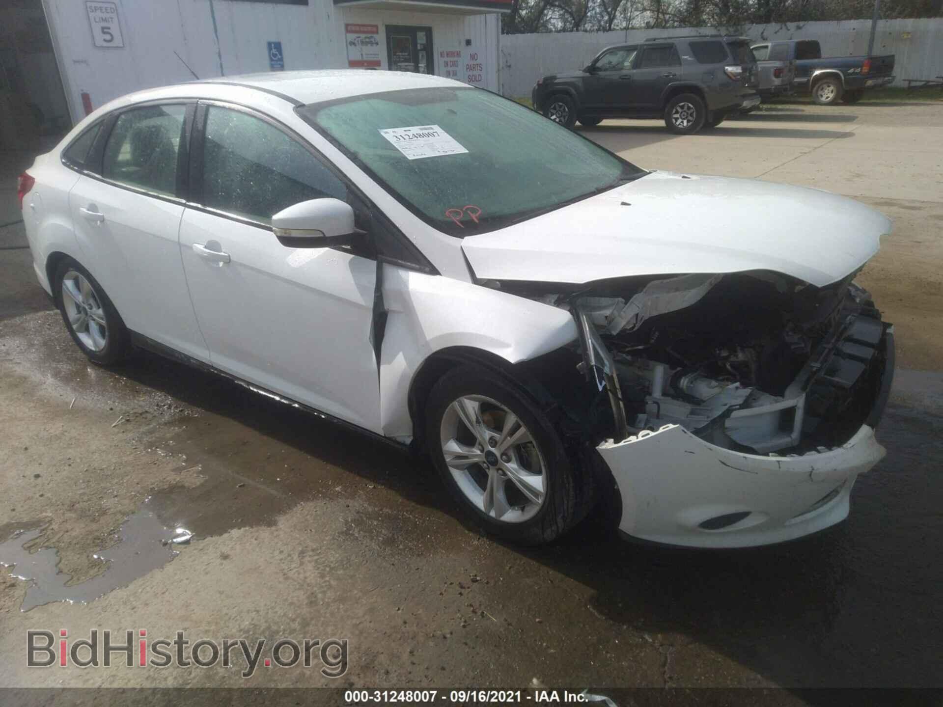 Фотография 1FADP3F25EL208877 - FORD FOCUS 2014