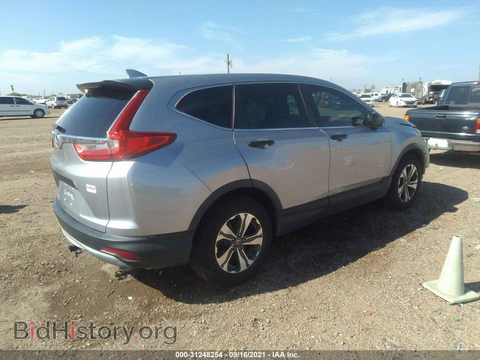 2017 HONDA CR-V - VIN: 7FARW5H38HE004073 - Фото 4