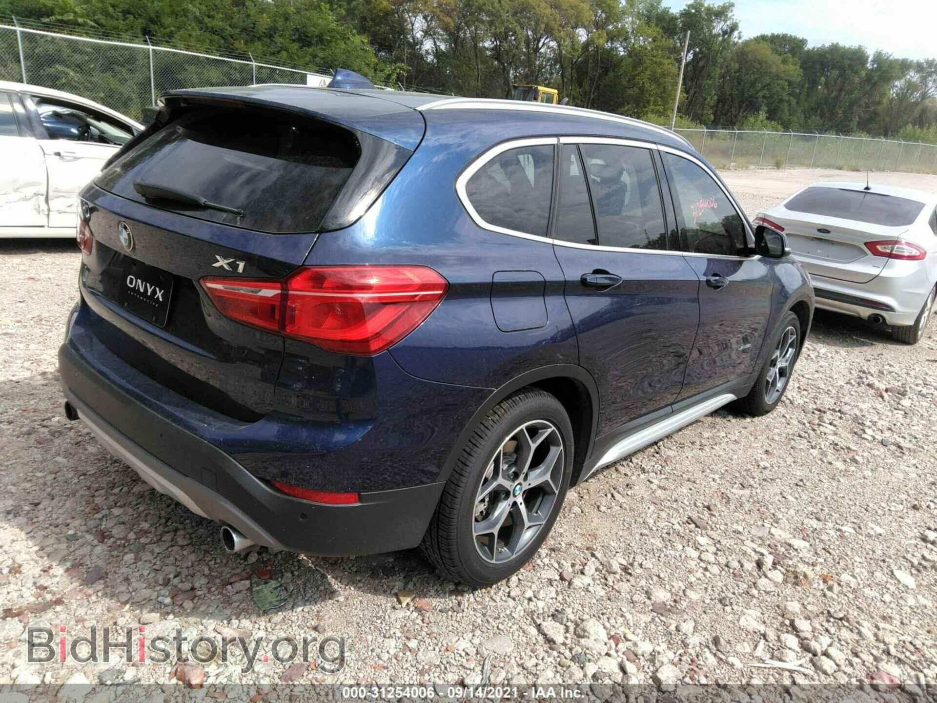 2017 BMW X1 - VIN: WBXHT3C31H5F81336 - Фото 4