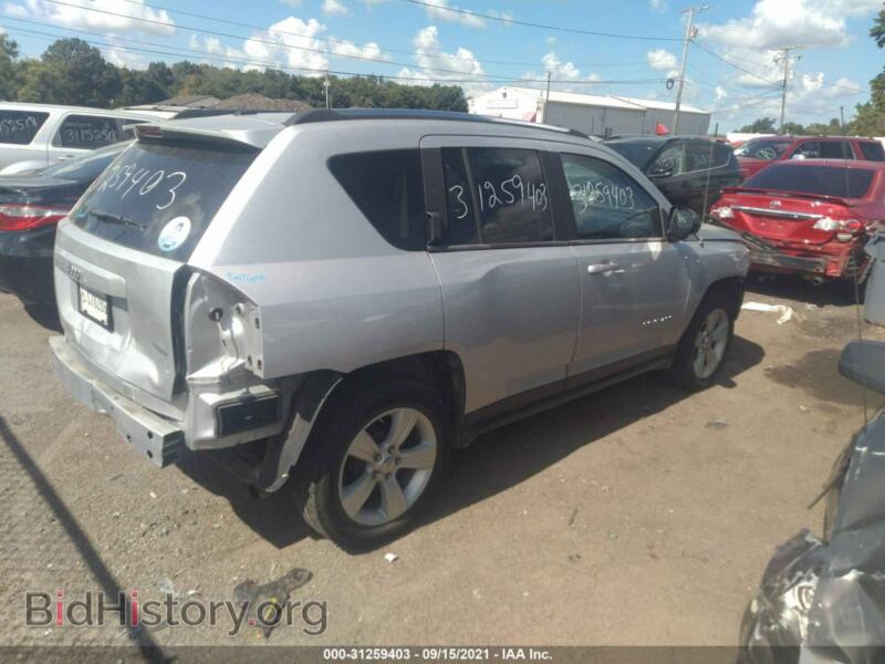 2011 Jeep COMPASS (VIN 1J4NT1FA2BD150992) — photo 4 of 12