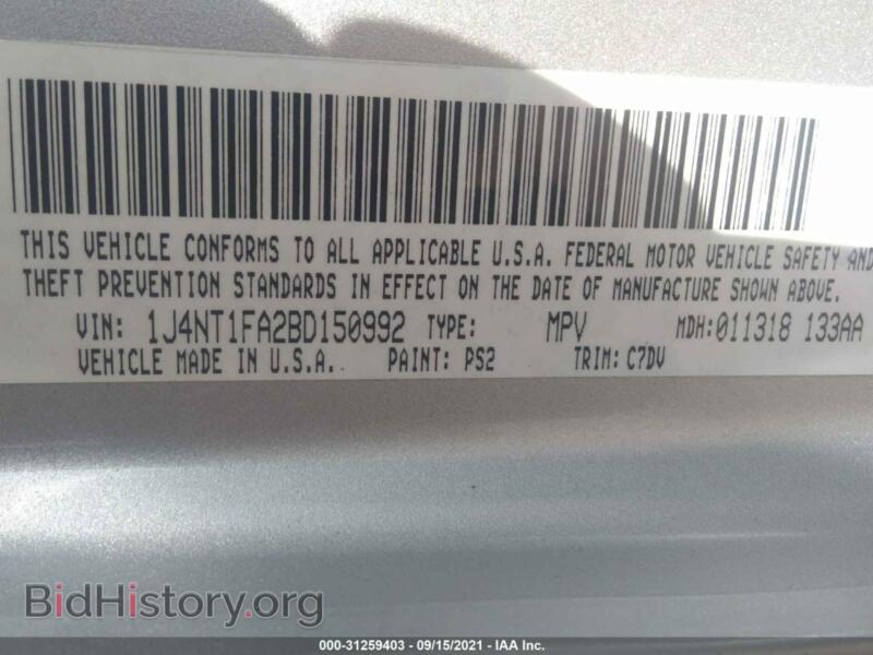 2011 Jeep COMPASS (VIN 1J4NT1FA2BD150992) — photo 9 of 12