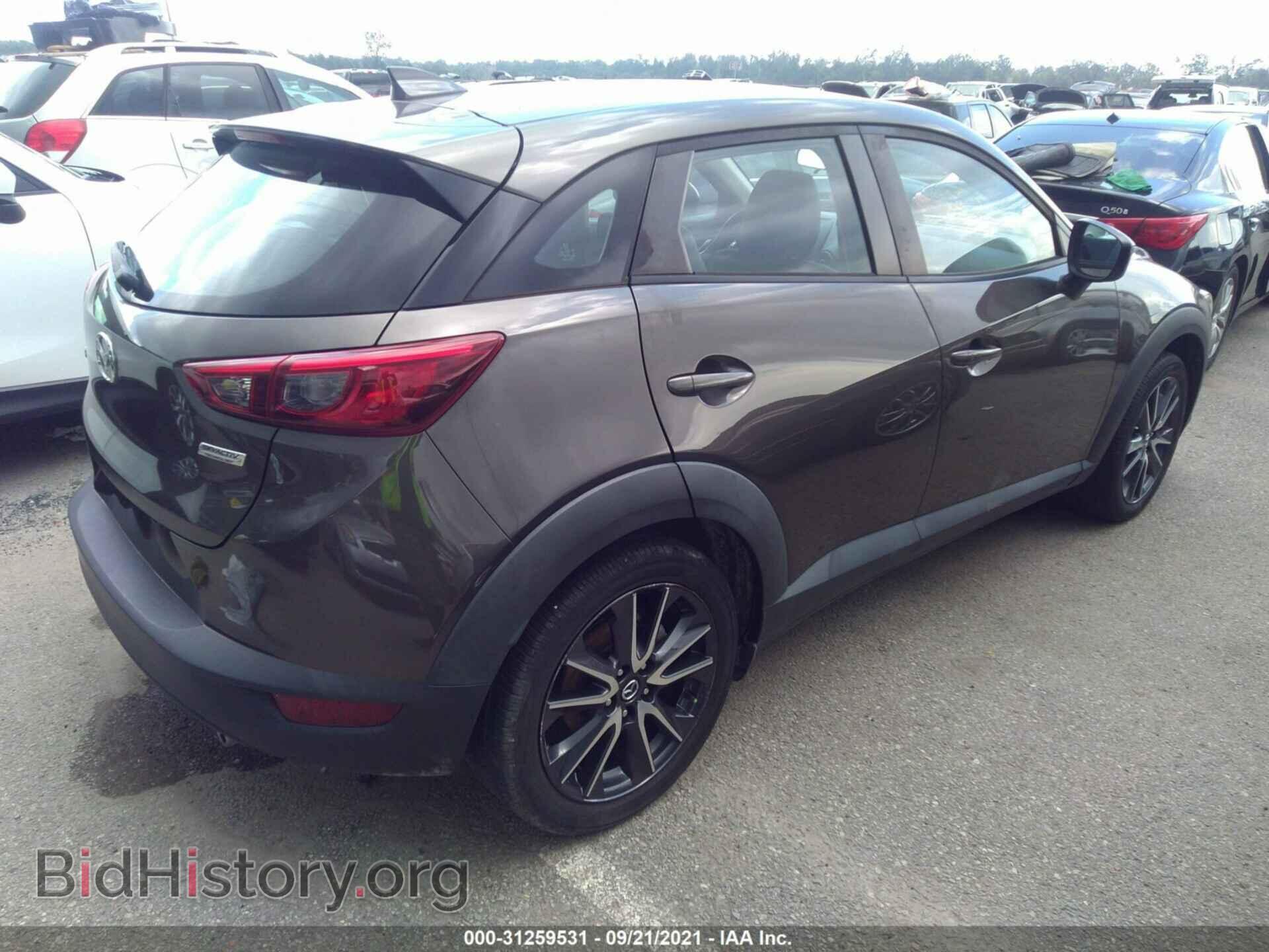 2018 MAZDA CX-3 - VIN: JM1DKDC77J0317786 - Фото 4