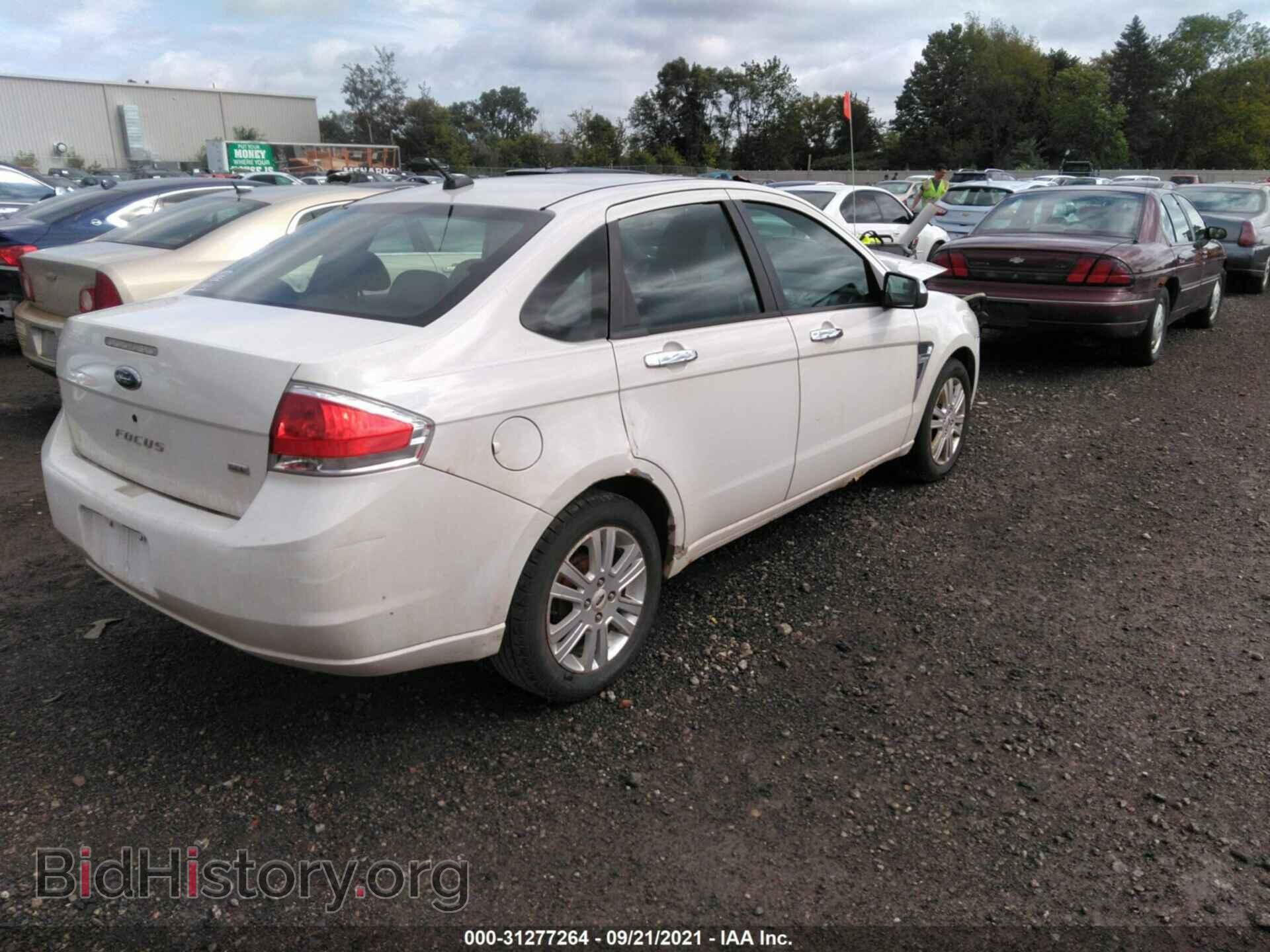 2009 FORD FOCUS - VIN: 1FAHP37N59W207629 - Фото 4