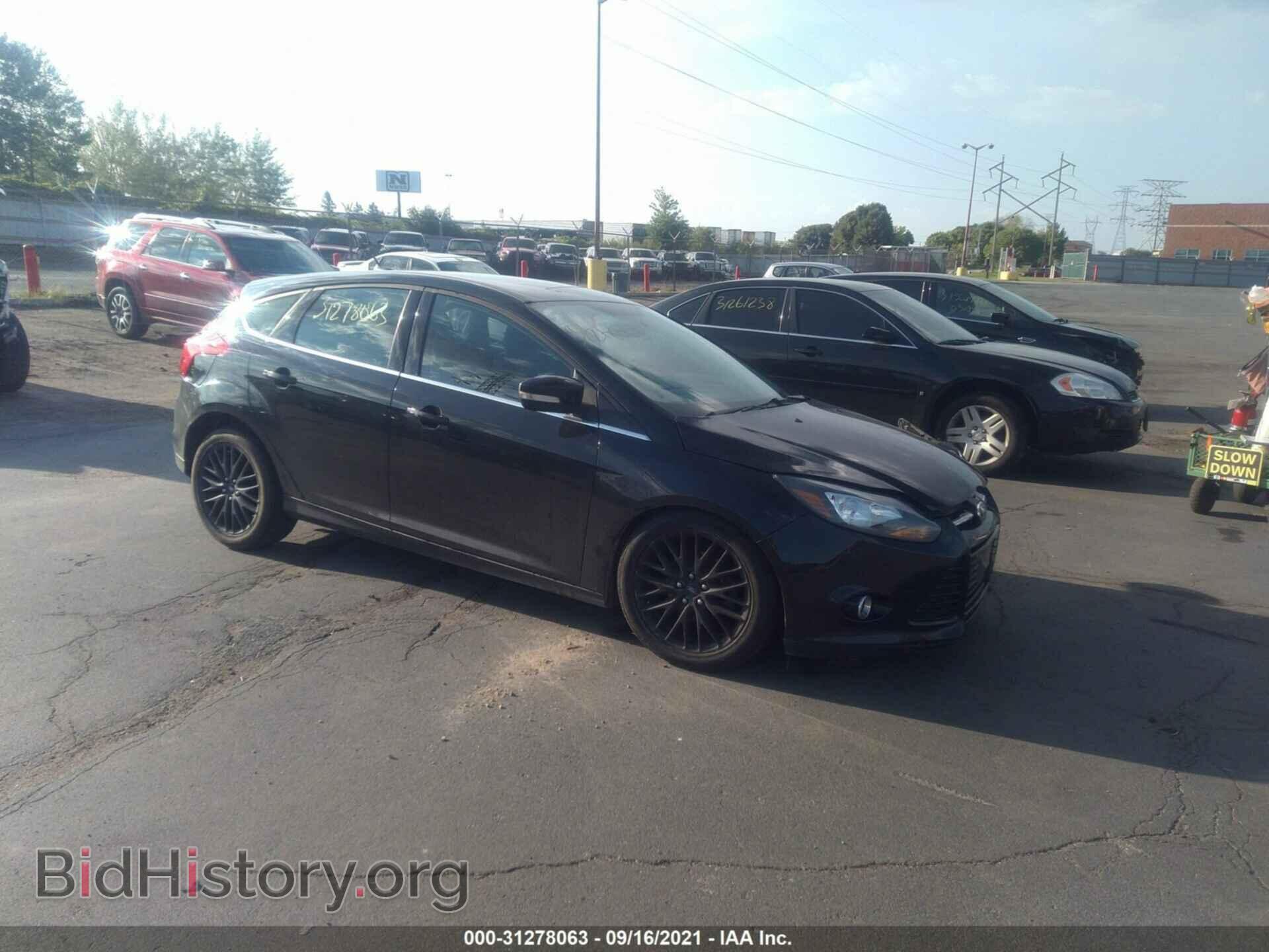 Фотография 1FADP3N21DL200825 - FORD FOCUS 2013