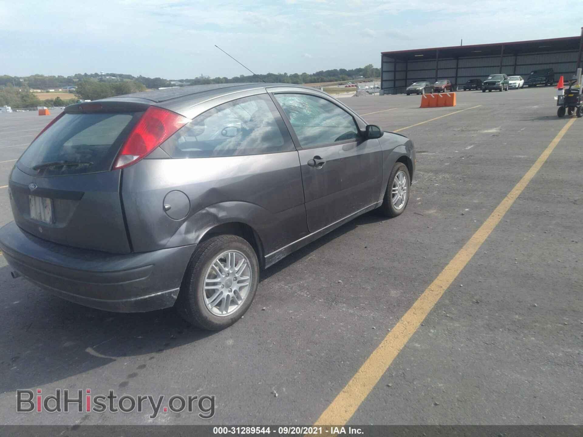 2007 FORD FOCUS - VIN: 1FAFP31N97W348751 - Photo 4