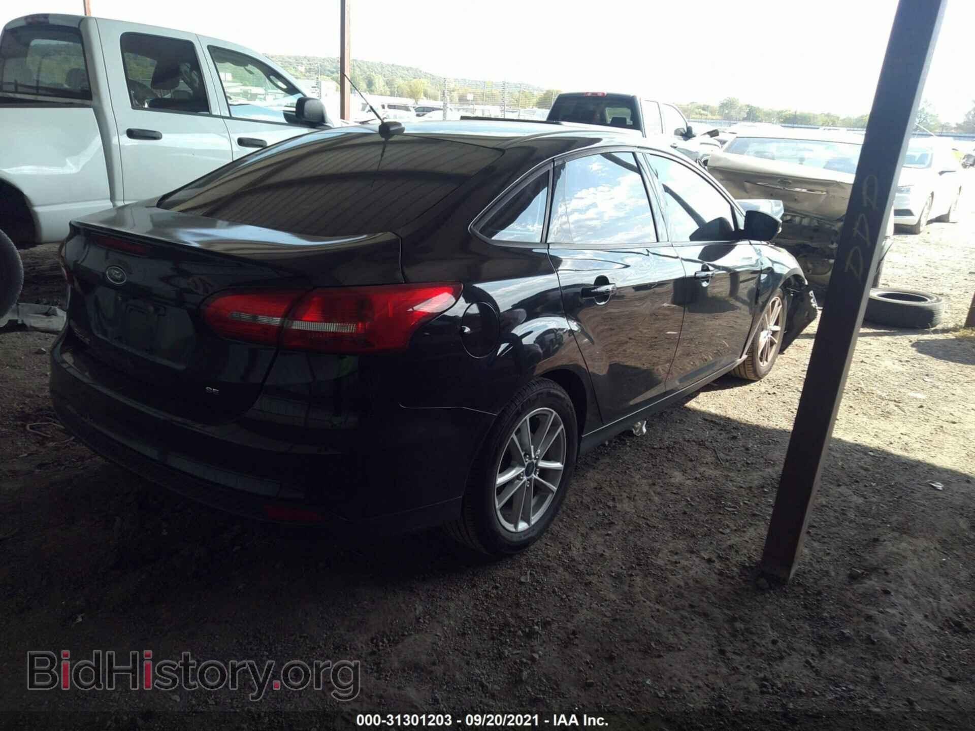 2017 FORD FOCUS - VIN: 1FADP3F25HL277220 - Фото 4