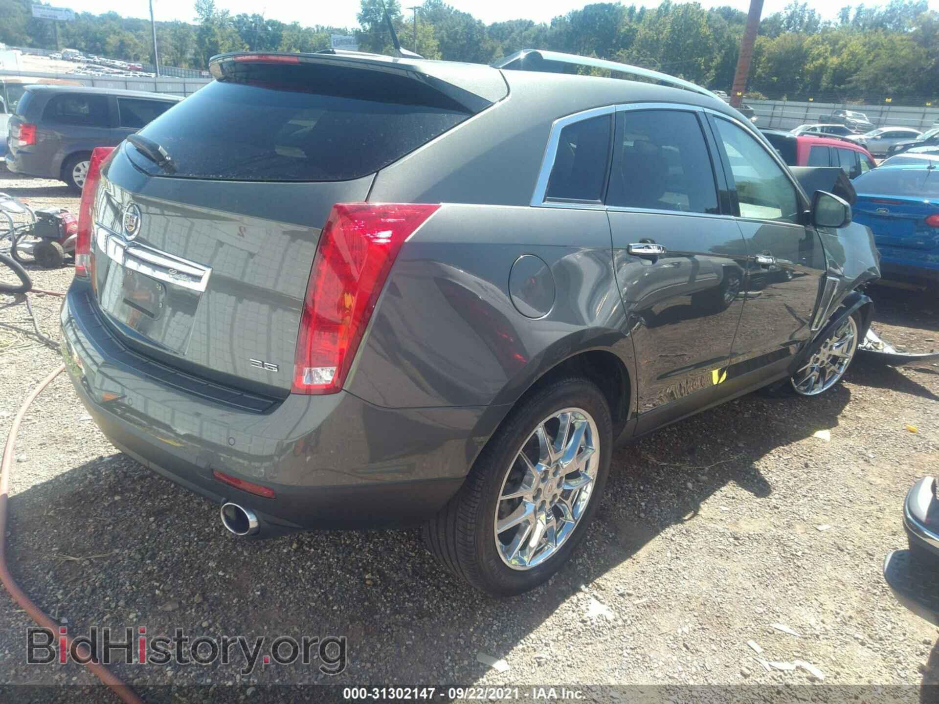 2013 CADILLAC SRX - VIN: 3GYFNDE34DS544676 - Фото 4