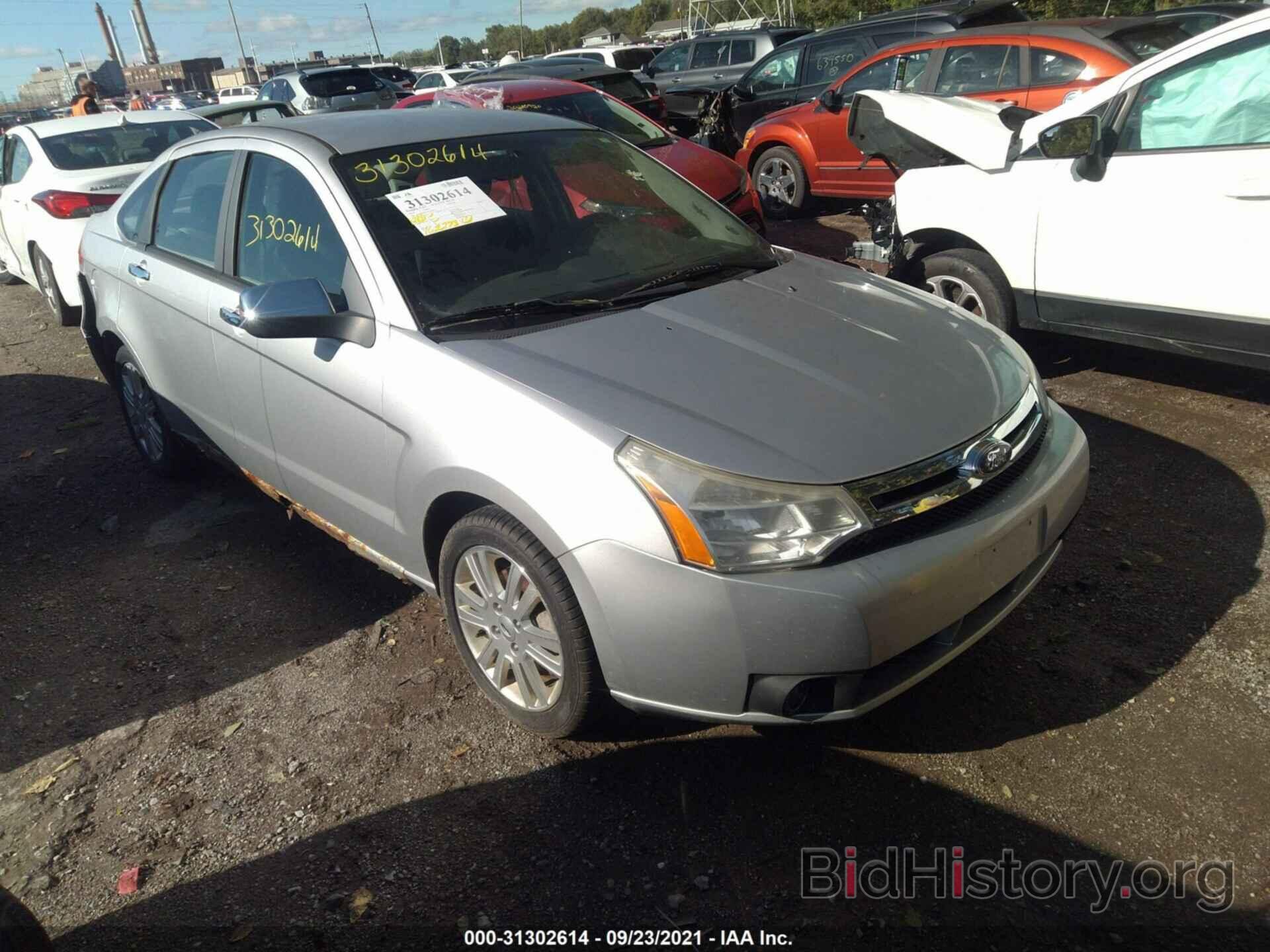 Photo 1FAHP3HN7AW146058 - FORD FOCUS 2010