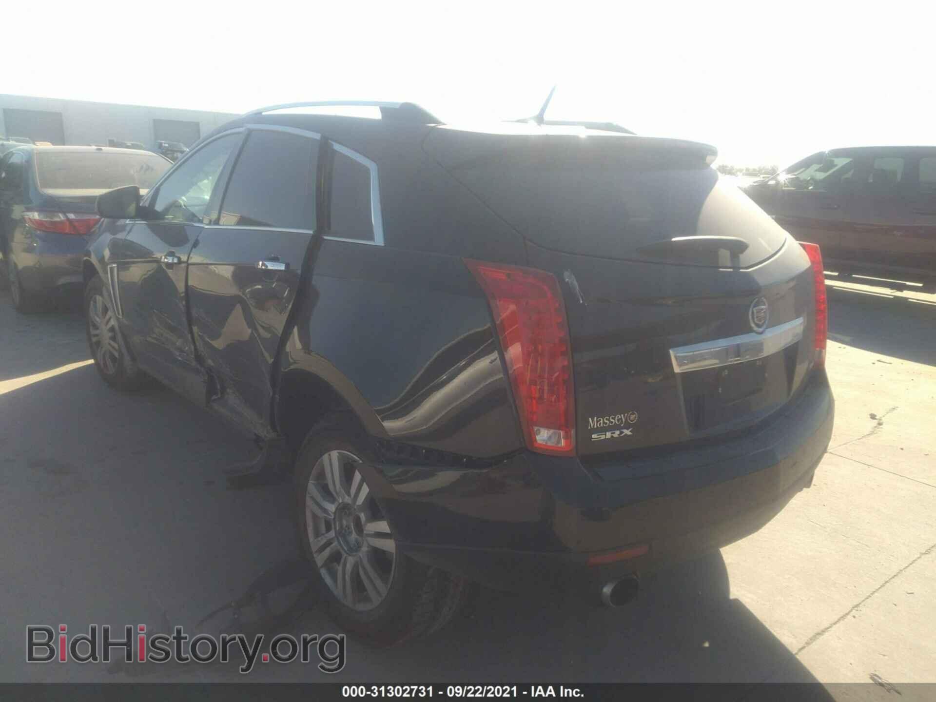 2014 CADILLAC SRX - VIN: 3GYFNBE30ES653335 - Фото 3