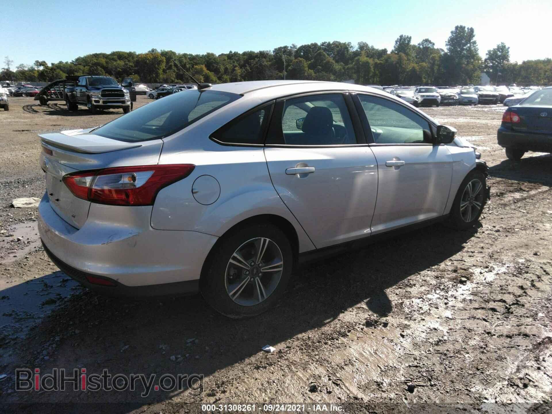 2014 FORD FOCUS - VIN: 1FADP3F24EL353070 - Photo 4