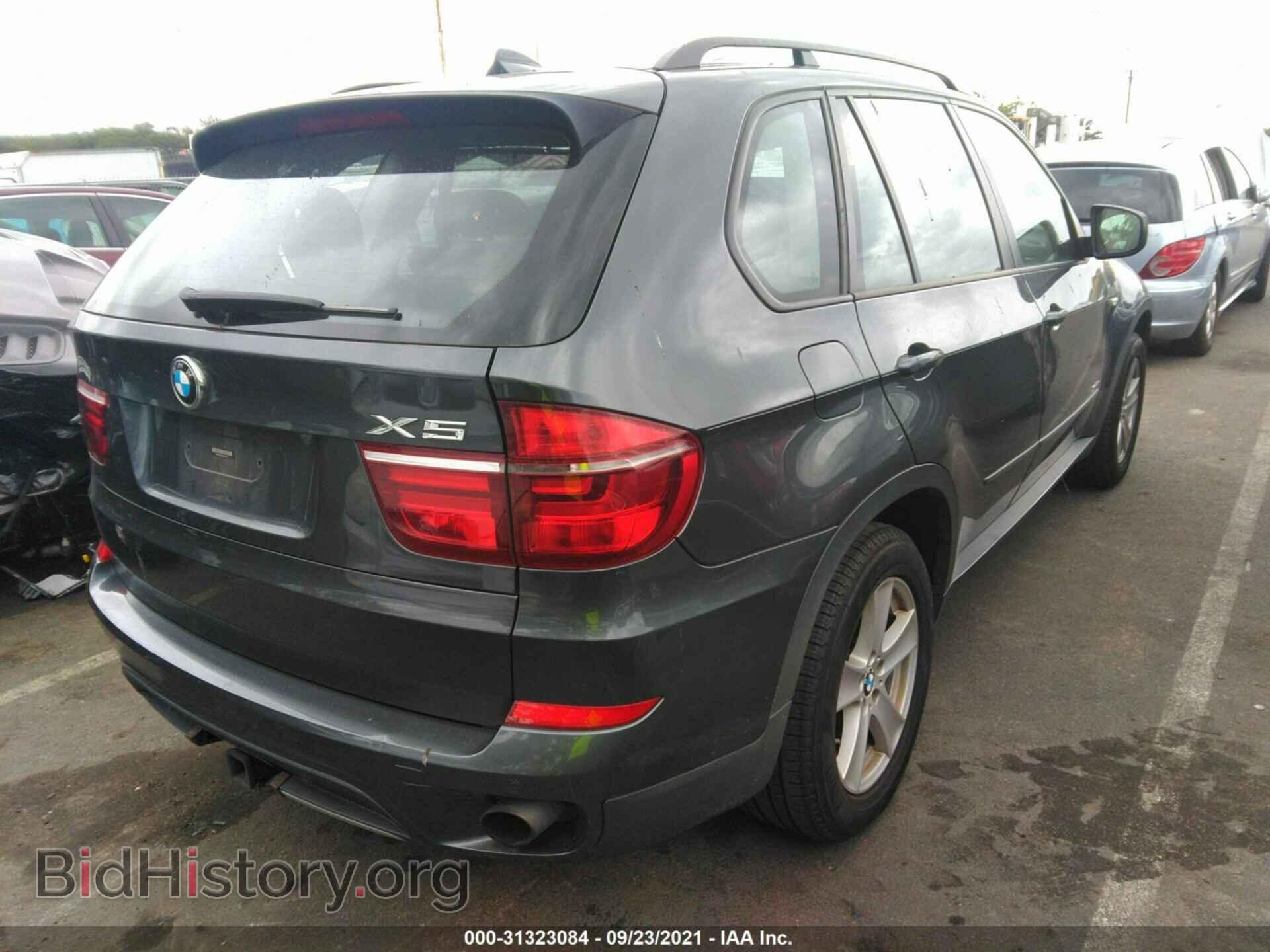 2013 BMW X5 - VIN: 5UXZV4C52D0E14217 - Фото 4