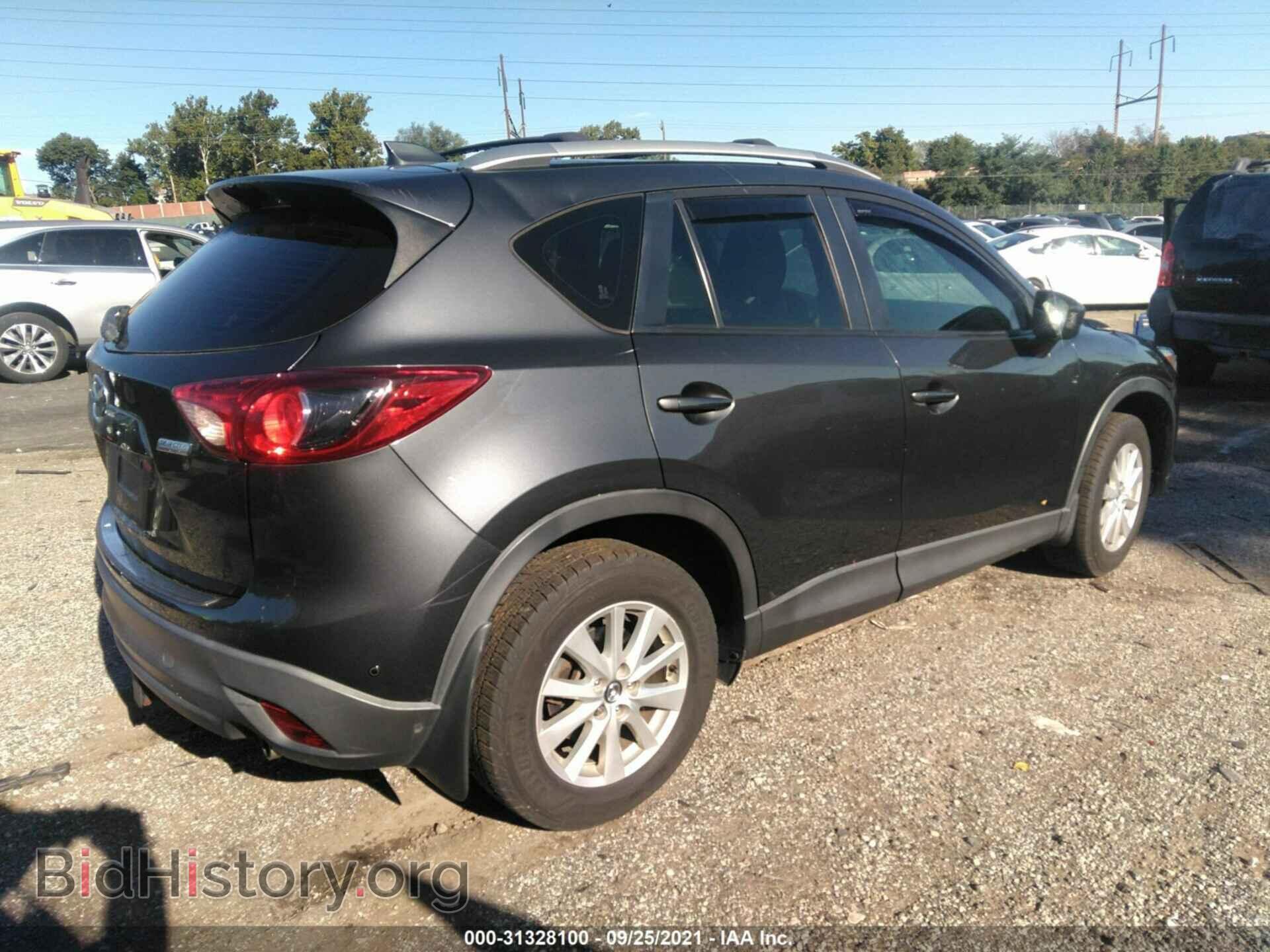 2014 MAZDA CX-5 - VIN: JM3KE4BE5E0330032 - Фото 4