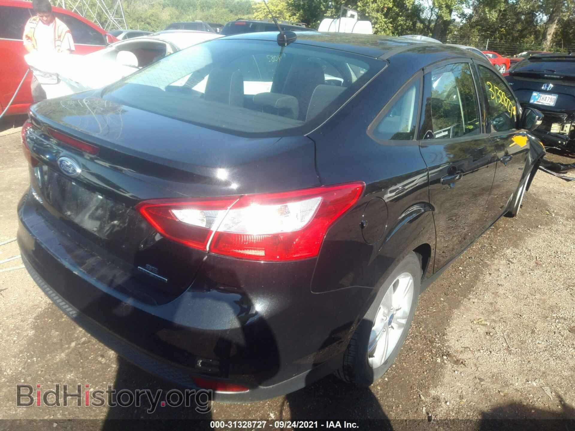 2013 FORD FOCUS - VIN: 1FADP3F23DL276111 - Photo 4