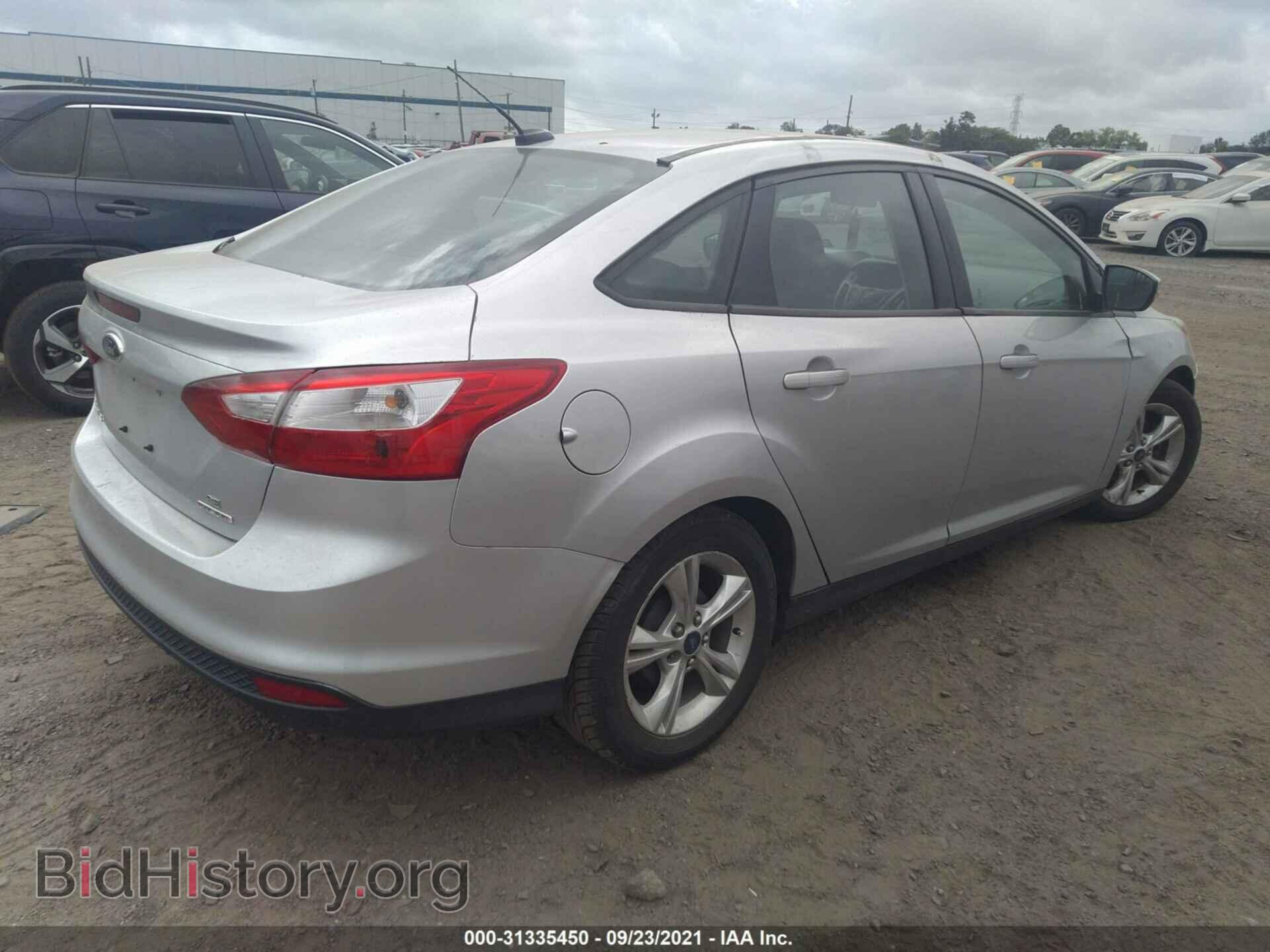 2014 FORD FOCUS - VIN: 1FADP3F2XEL277614 - Photo 4