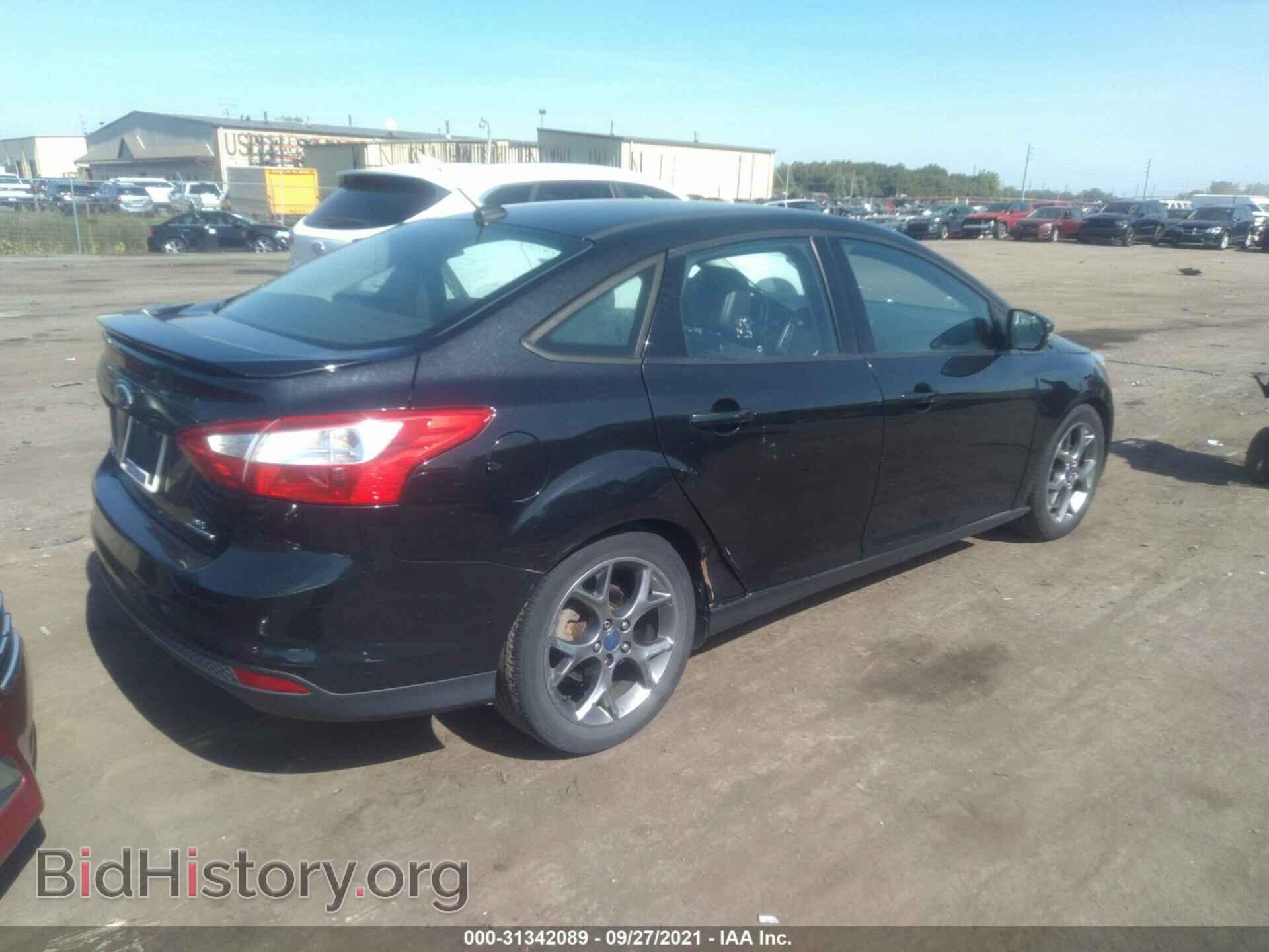 2014 FORD FOCUS - VIN: 1FADP3F22EL293340 - Photo 4