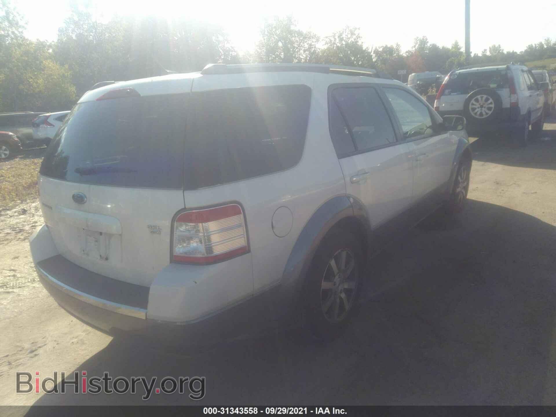 2009 FORD TAURUS X - VIN: 1FMDK05W59GA00200 - Фото 4