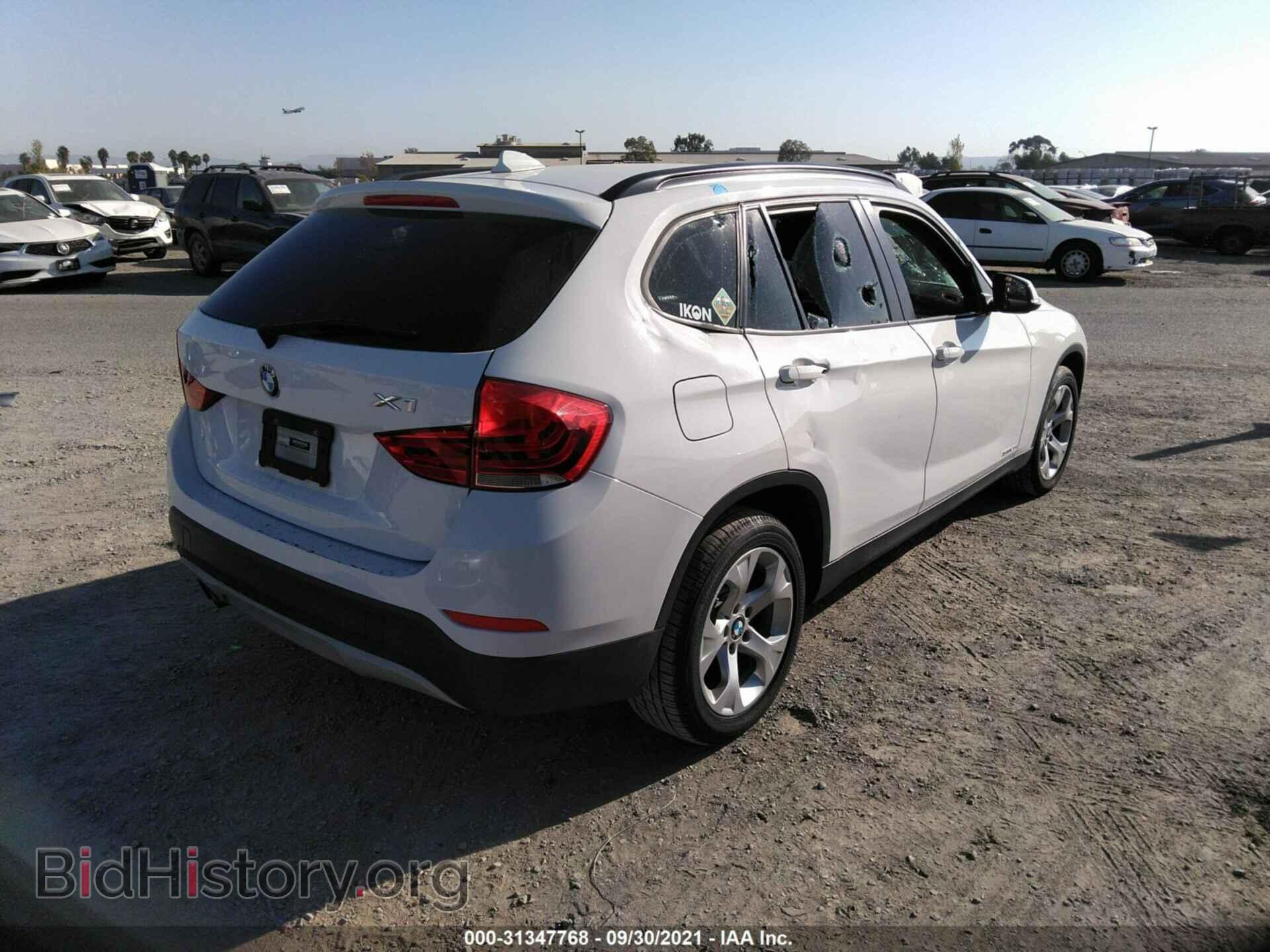 2014 BMW X1 - VIN: WBAVM1C50EVW55354 - Фото 4