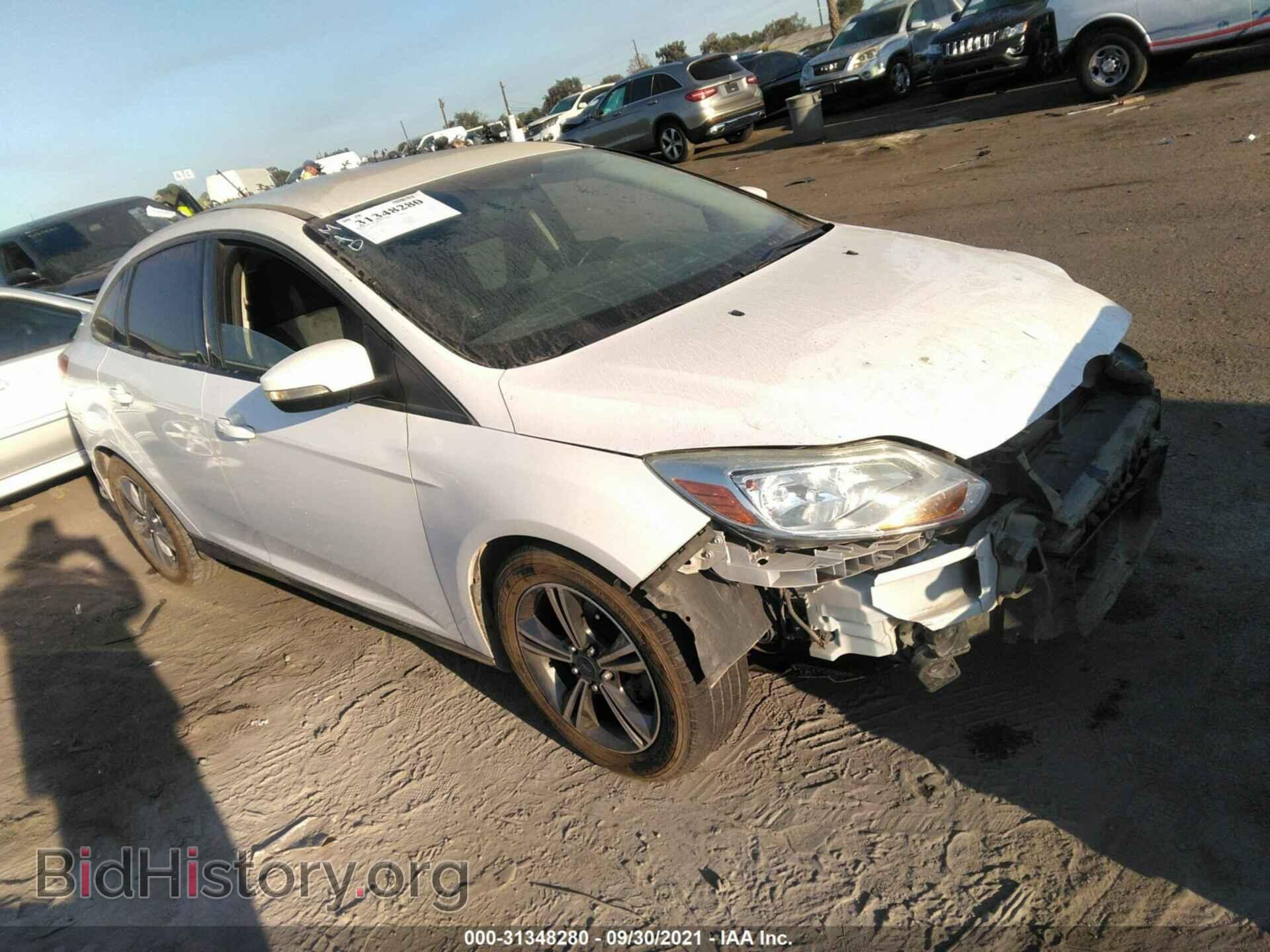 Фотография 1FADP3F29EL399624 - FORD FOCUS 2014