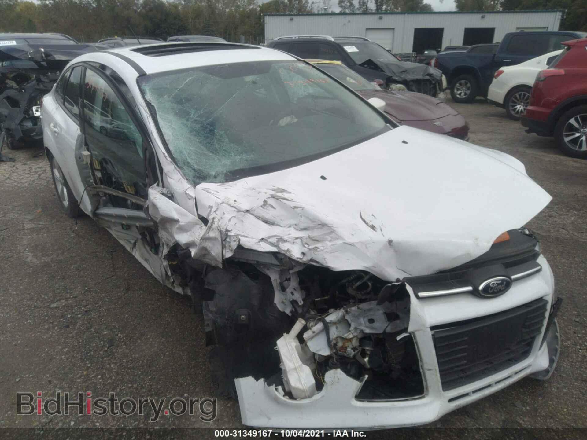 Фотография 1FADP3F26DL280475 - FORD FOCUS 2013