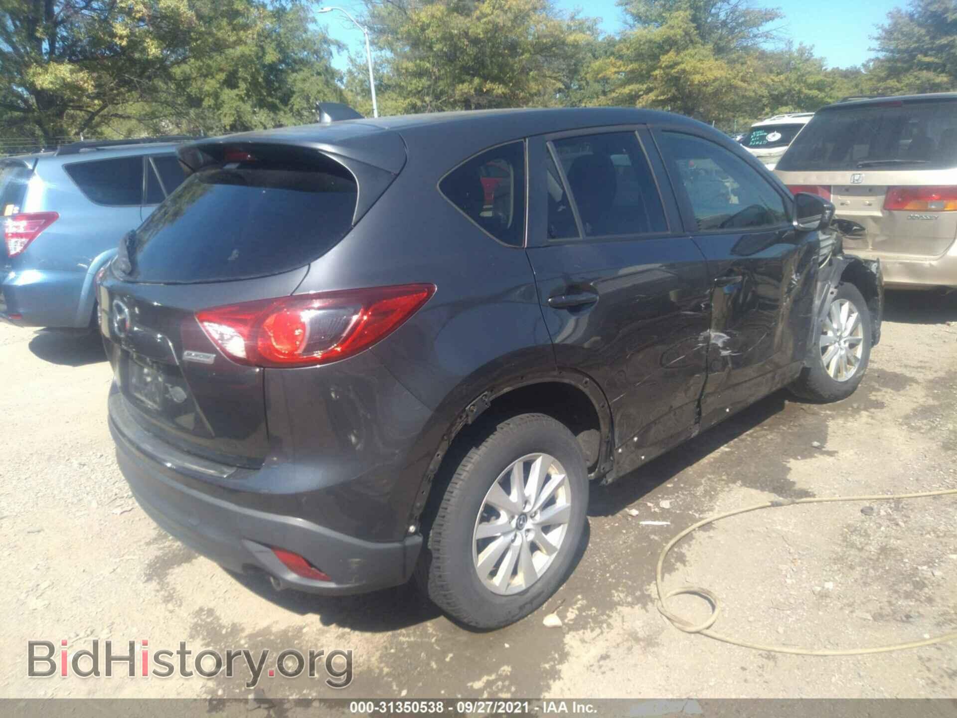 2014 MAZDA CX-5 - VIN: JM3KE4CY4E0343430 - Фото 4
