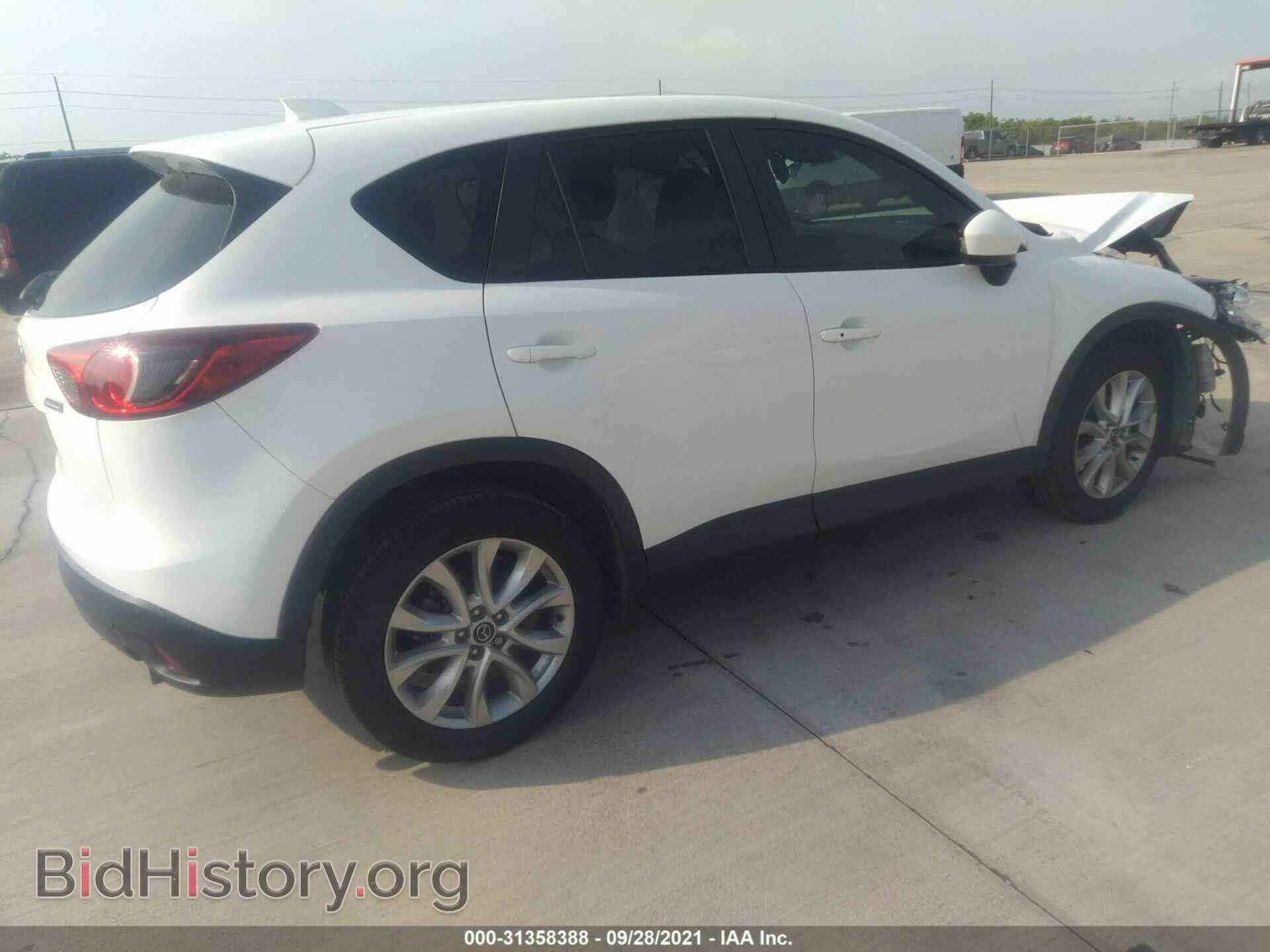 2014 MAZDA CX-5 - VIN: JM3KE2DY7E0415000 - Фото 4
