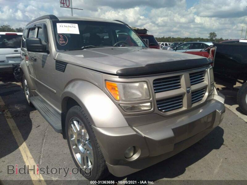 2010 Dodge NITRO SXT (VIN 1D4PT5GK3AW124274) — photo 1 of 11, IAAI, damage: storm damage