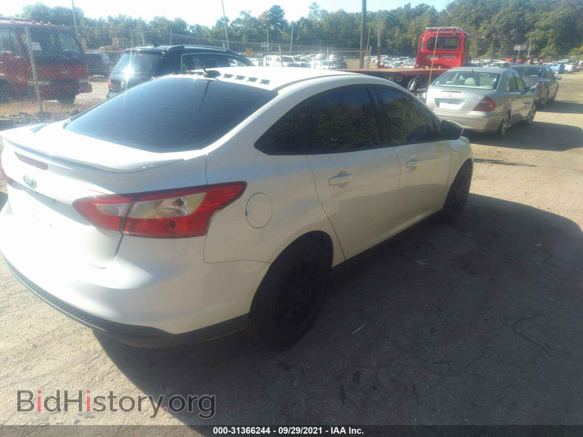 2012 FORD FOCUS - VIN: 1FAHP3F23CL290963 - Photo 4