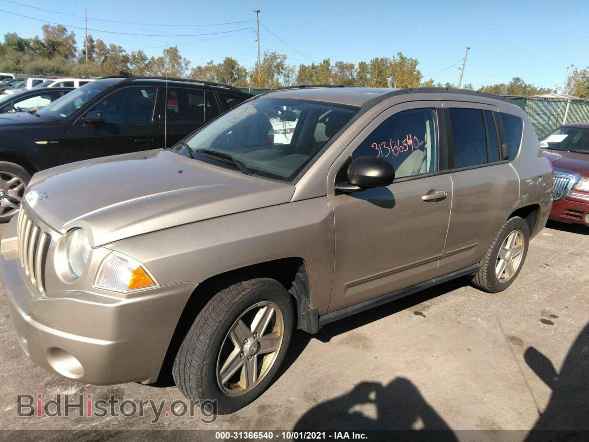 2010 JEEP COMPASS - VIN: 1J4NT4FA1AD520894 - Фото 2