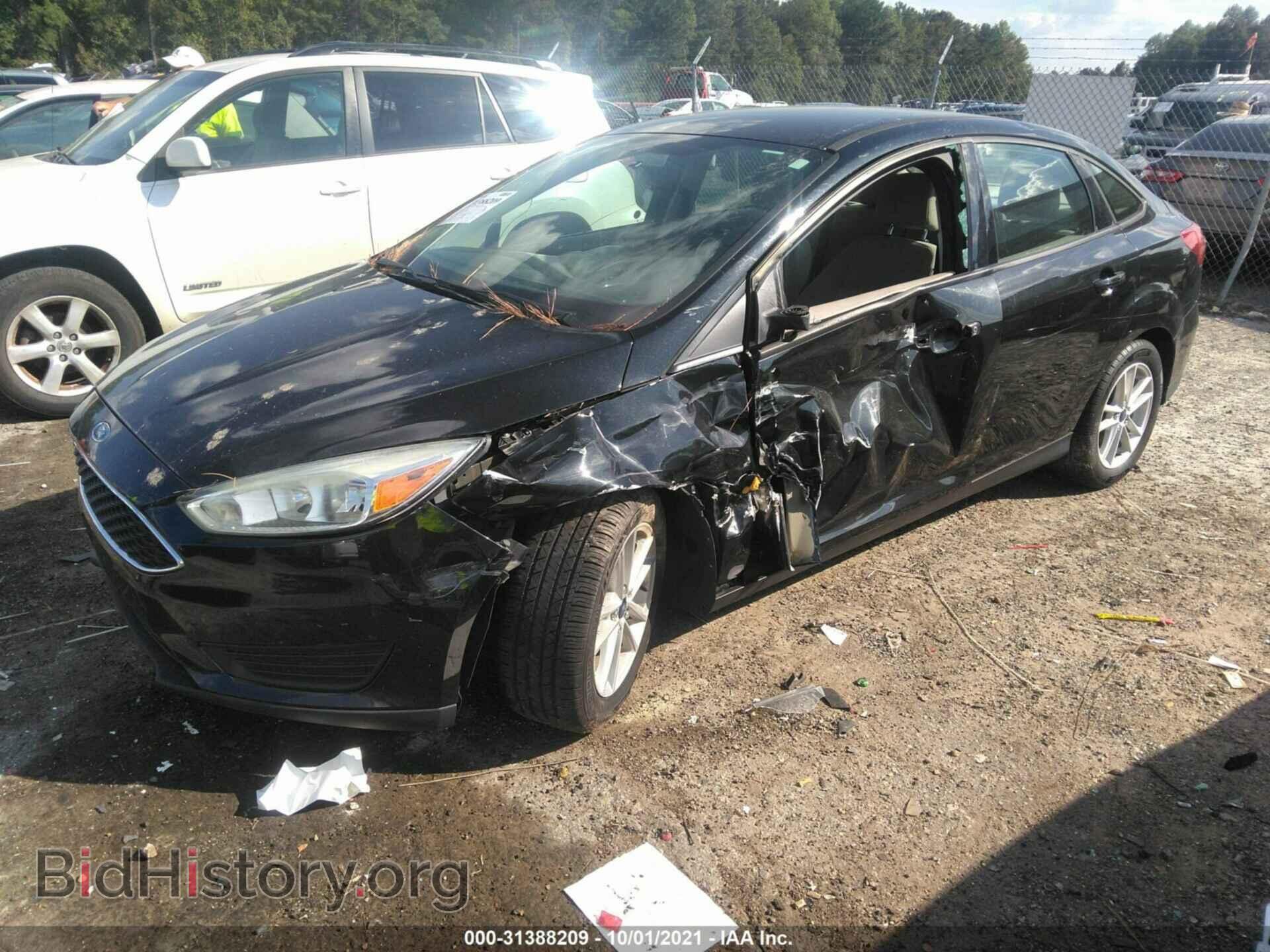 2015 FORD FOCUS - VIN: 1FADP3F20FL252464 - Photo 2