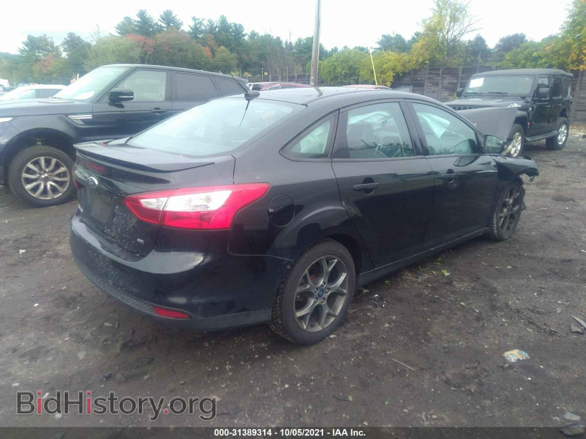 2014 FORD FOCUS - VIN: 1FADP3F23EL214970 - Photo 4