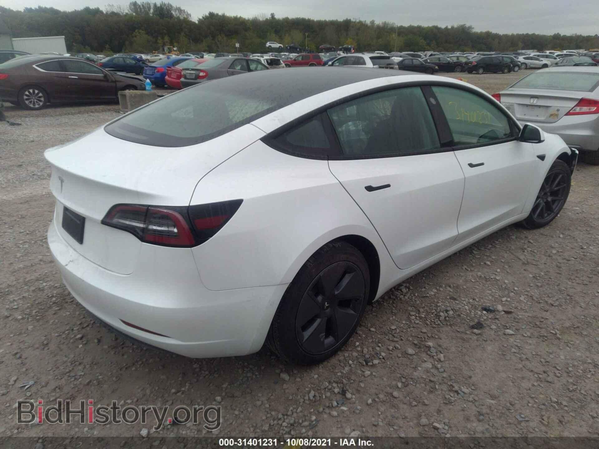 2021 TESLA MODEL 3 - VIN: 5YJ3E1EA7MF989105 - Photo 4
