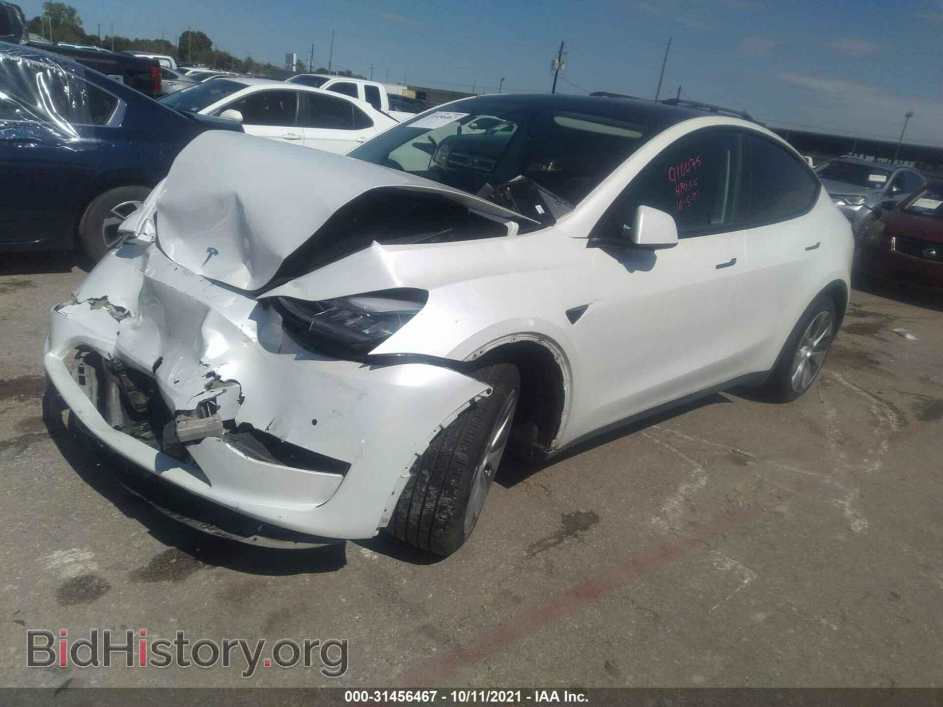 2021 TESLA MODEL Y - VIN: 5YJYGDED1MF113738 - Photo 2
