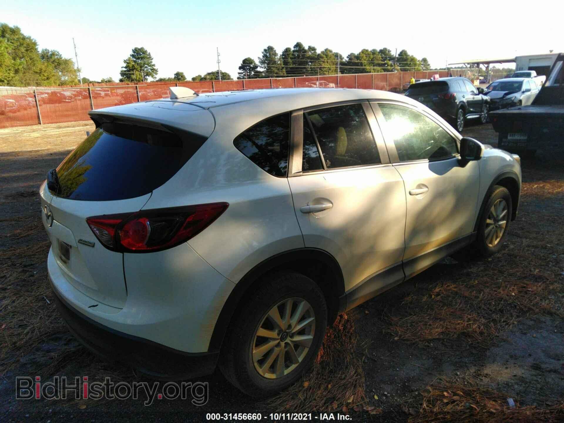 2014 MAZDA CX-5 - VIN: JM3KE2CY6E0320719 - Фото 4