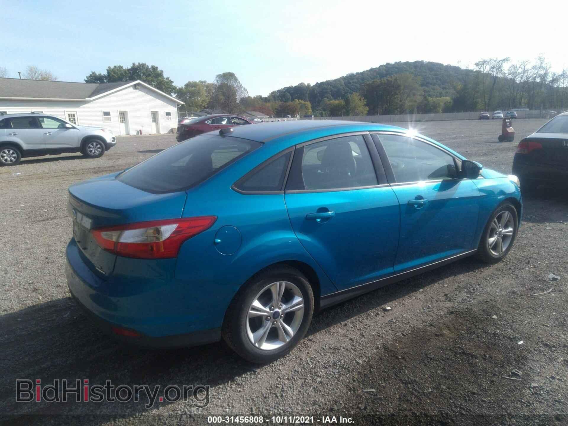 2014 FORD FOCUS - VIN: 1FADP3F22EL148184 - Photo 4