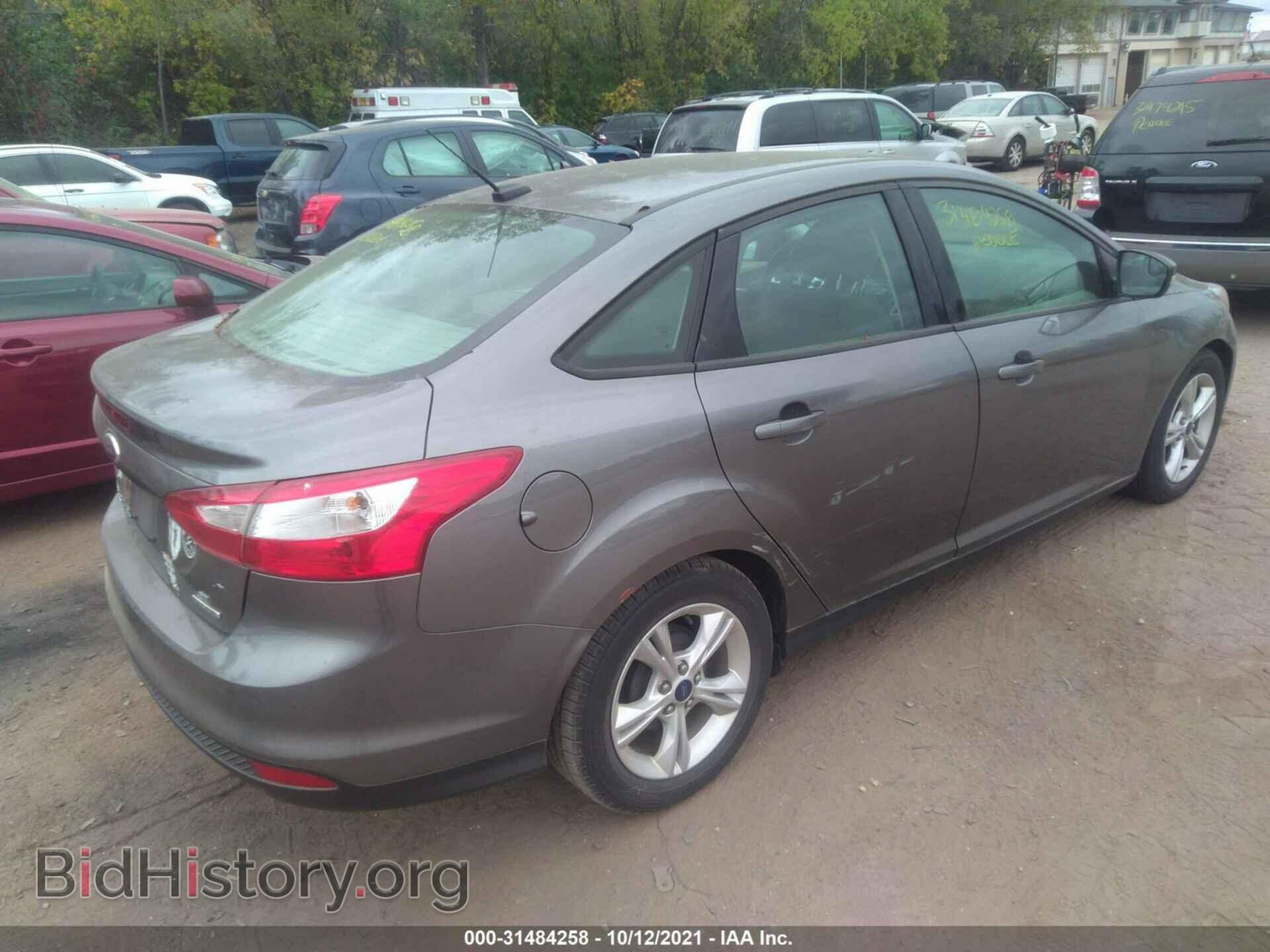 2014 FORD FOCUS - VIN: 1FADP3F2XEL452881 - Photo 4