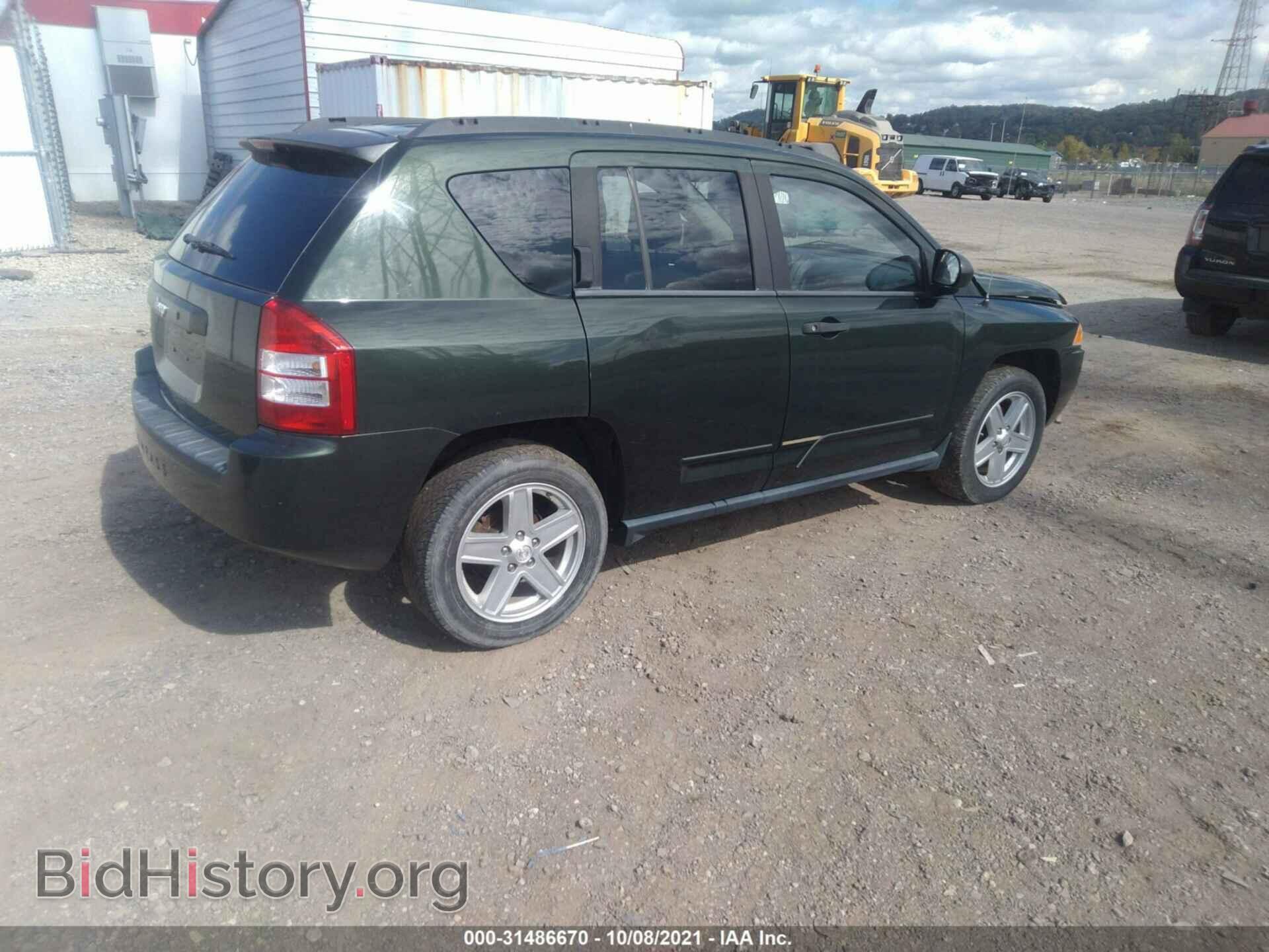 2010 JEEP COMPASS - VIN: 1J4NF1FB2AD623112 - Фото 4