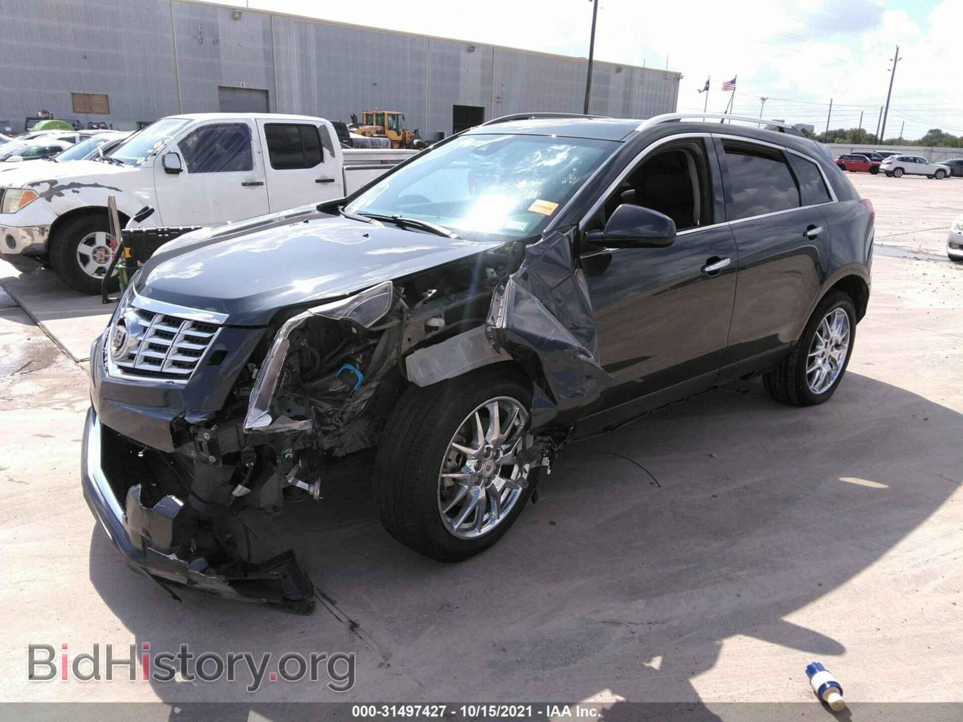 2014 CADILLAC SRX - VIN: 3GYFNCE34ES587278 - Фото 2