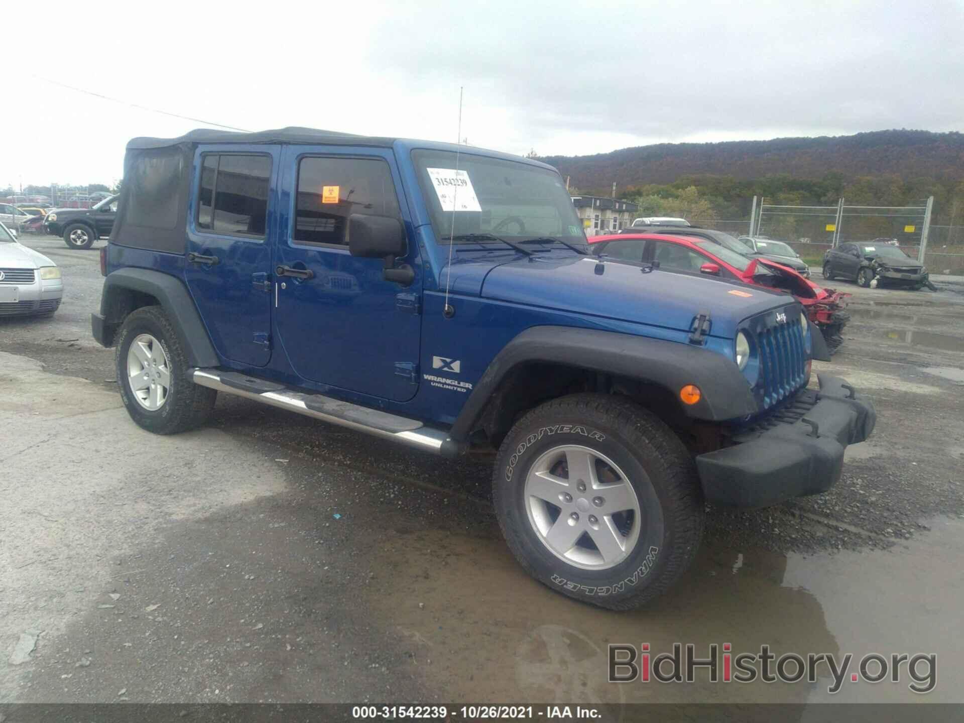 Photo 1J4GA39119L740672 - JEEP WRANGLER UNLIMITED 2009